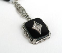 14 Karat White Gold Art Deco Onyx Diamond Pendant Necklace