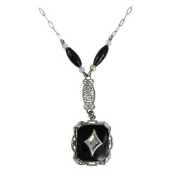 Collier pendentif Art déco en or blanc 14 carats avec onyx et diamants