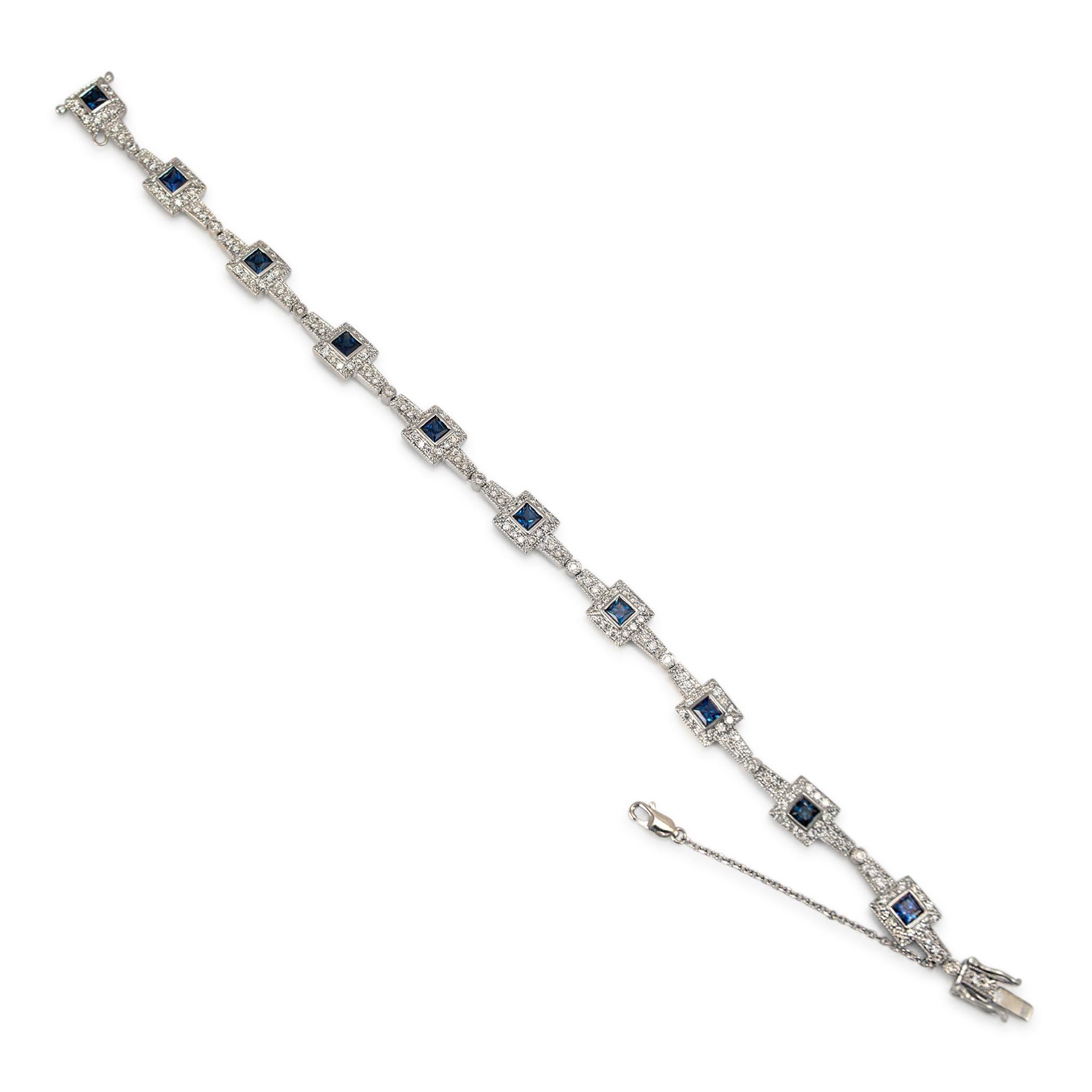 Geschlecht: Damen

Metall Typ: 14K Weißgold

Länge: 6,75 Zoll

Breite: 6,70 mm

Gewicht: 11.09 Gramm

Diamant- und Saphirarmband aus 14K Weißgold im klassischen Stil. Das Metall wurde getestet und es wurde festgestellt, dass es sich um 14 Karat