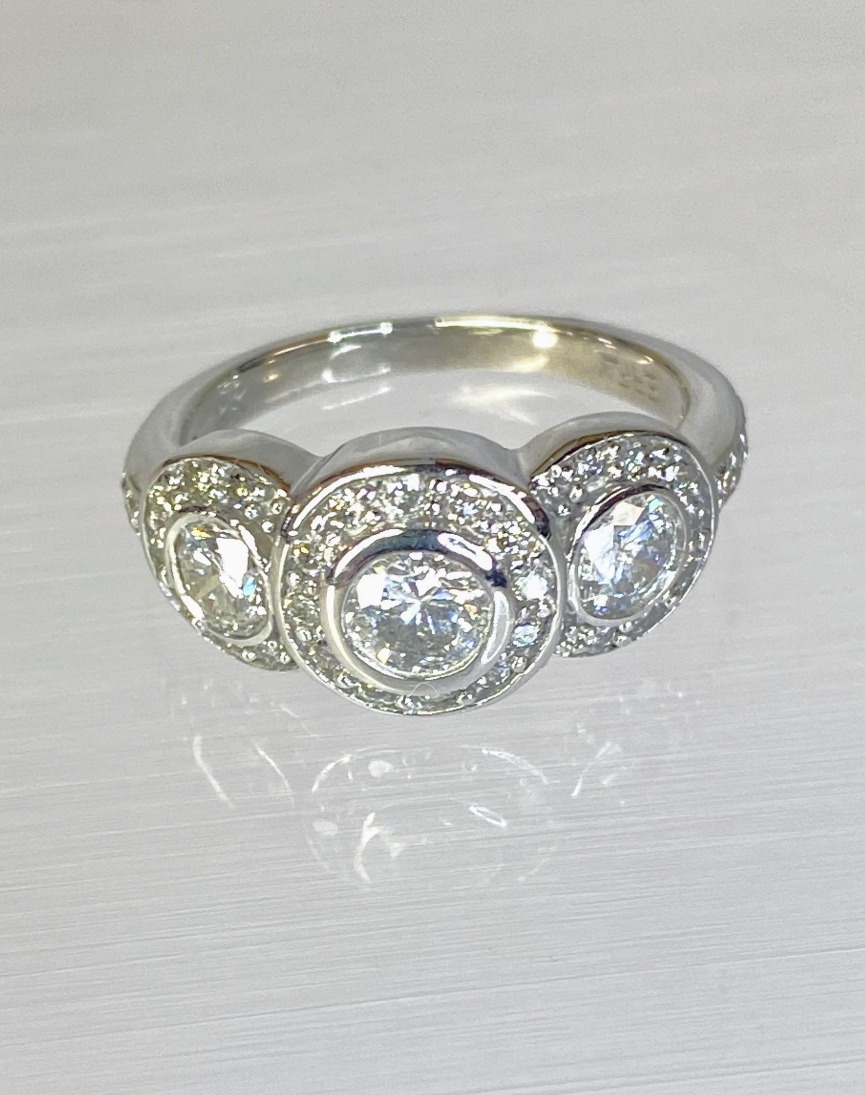 Brilliant Cut 14K White Gold Art Deco Style Three Stone Circlet Halo Bezel Engagement Ring For Sale