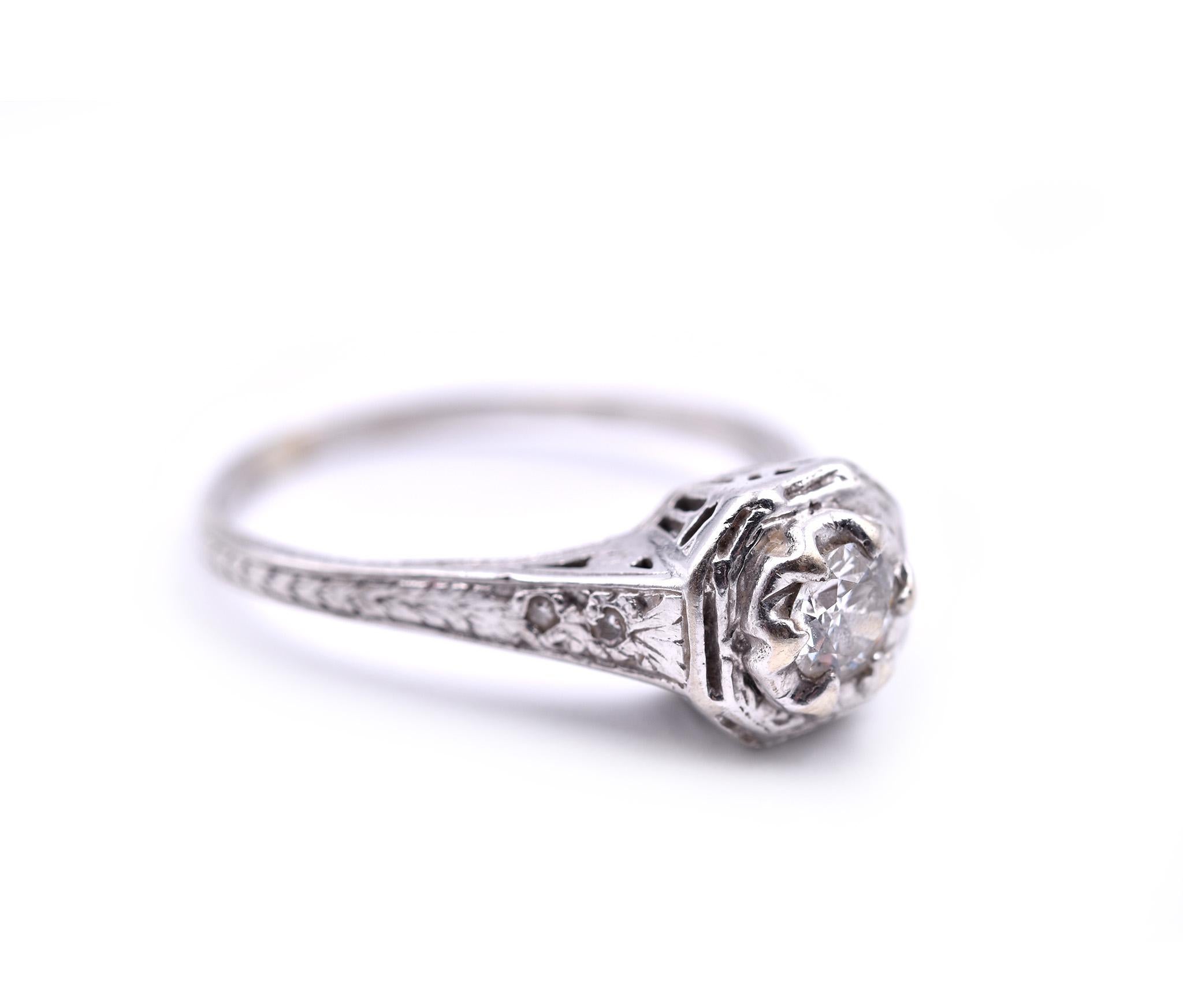 Designer: custom design
Material: 14k white gold 
Center Diamond: European cut = .36ct
Color: H	
Clarity: SI1
Diamond: four diamonds= .02cttw
Ring Size: 8 ¾ (please allow two additional shipping days for sizing requests)
Dimensions: ring top is