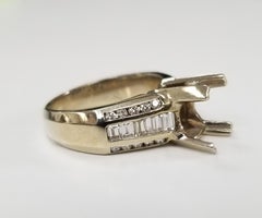 14 Karat White Gold Baguette and Round Channel Set Ring