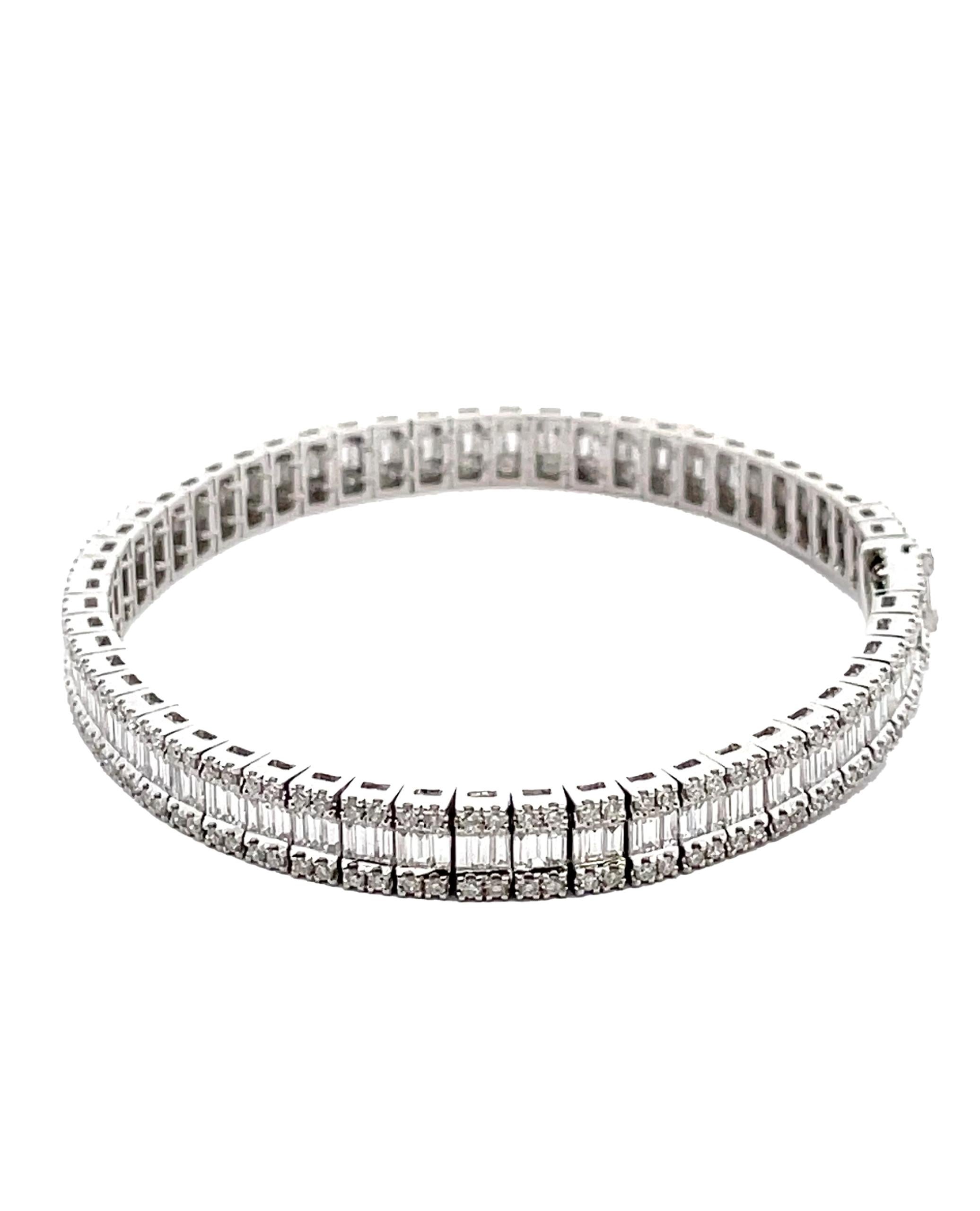 14K white gold tennis bracelet with 232 round brilliant-cut diamonds weighing 1.57 carats total and 174 straight baguette diamonds weighing 3.05 carats total.

* 7 inches long
* G/H color, SI clarity