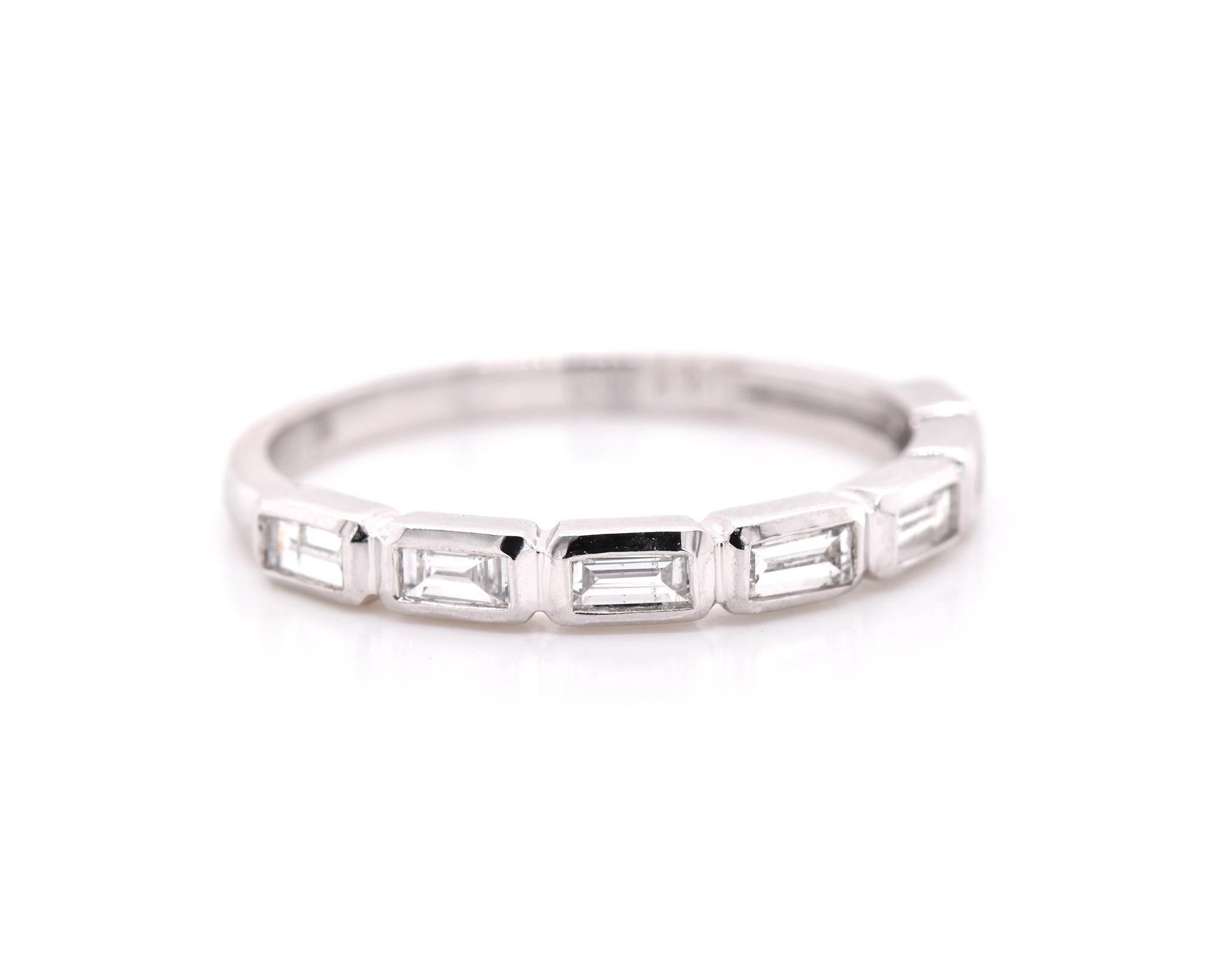 Designer: Watchlink
Material: 14k white gold
Diamonds: 7 round baguette cuts = 0.29cttw
Color: G
Clarity: VS
Size: 6 ¾ (please allow two additional shipping days for sizing requests)  
Dimensions: ring measures 2.50mm in width
Weight: 1.7 grams
