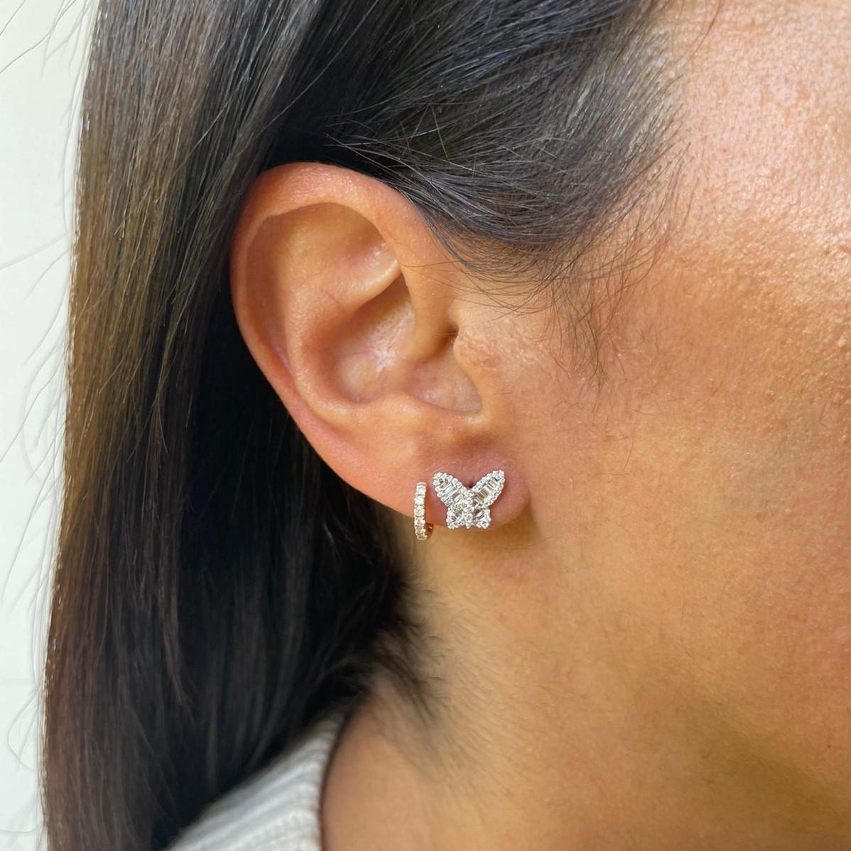 Diamond Butterfly Earrings : Crafted of real 14k gold, these popular butterfly earrings feature natural white sparkling diamonds approximately 0.43 ct. Certified diamonds. Diamond Color & Clarity GH-SI1 Measures approximately 1/2 Inch. Secured with