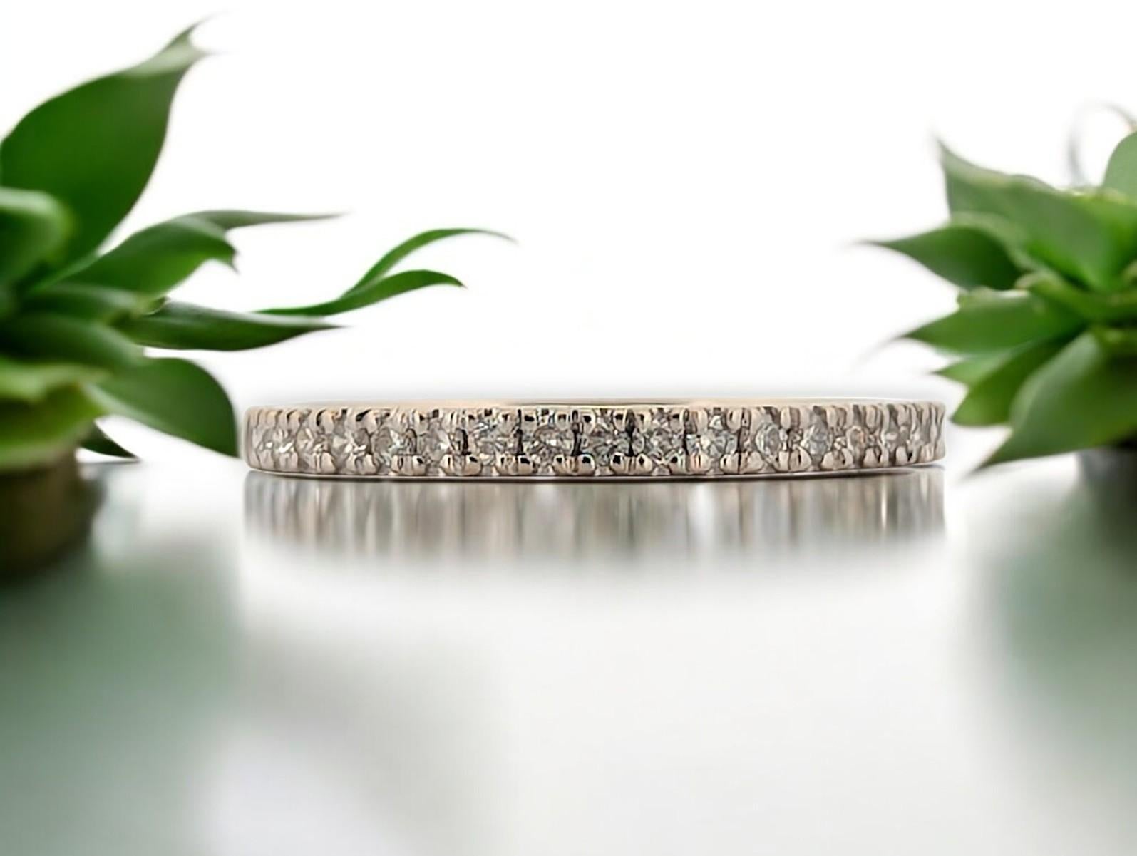 This elegant 14K white gold band features .33 CTW natural diamonds, creating a timeless and sophisticated look. Its delicate design makes it perfect for stacking, wearing as a wedding band, or gifting for a special occasion.

✨ Features:

Crafted in