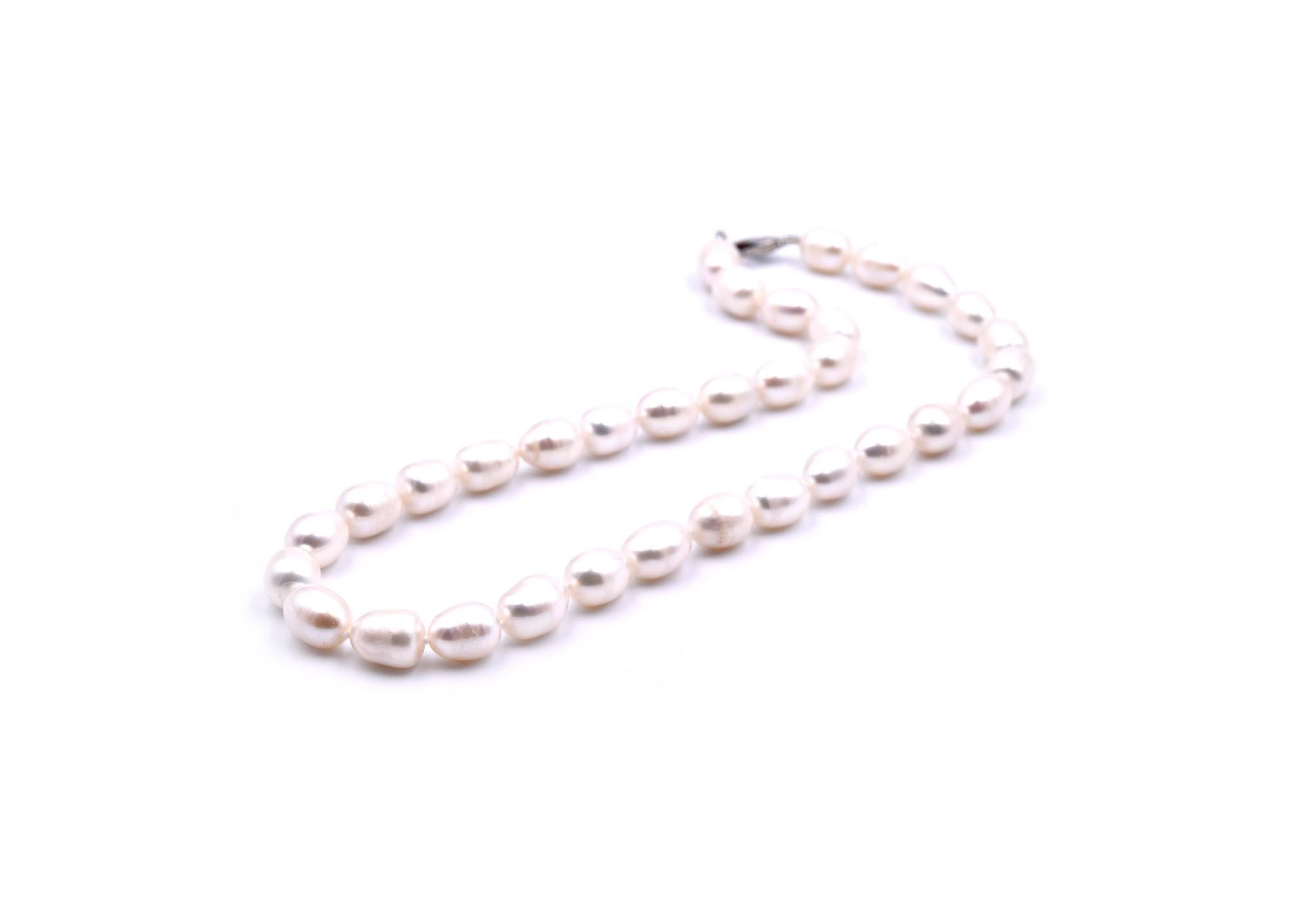 Designer: custom design
Material: 14k white gold
Banded Pearls: 11.25mm 
Dimensions: necklace is 18 ½ -inch long
Weight: 58.37 grams
