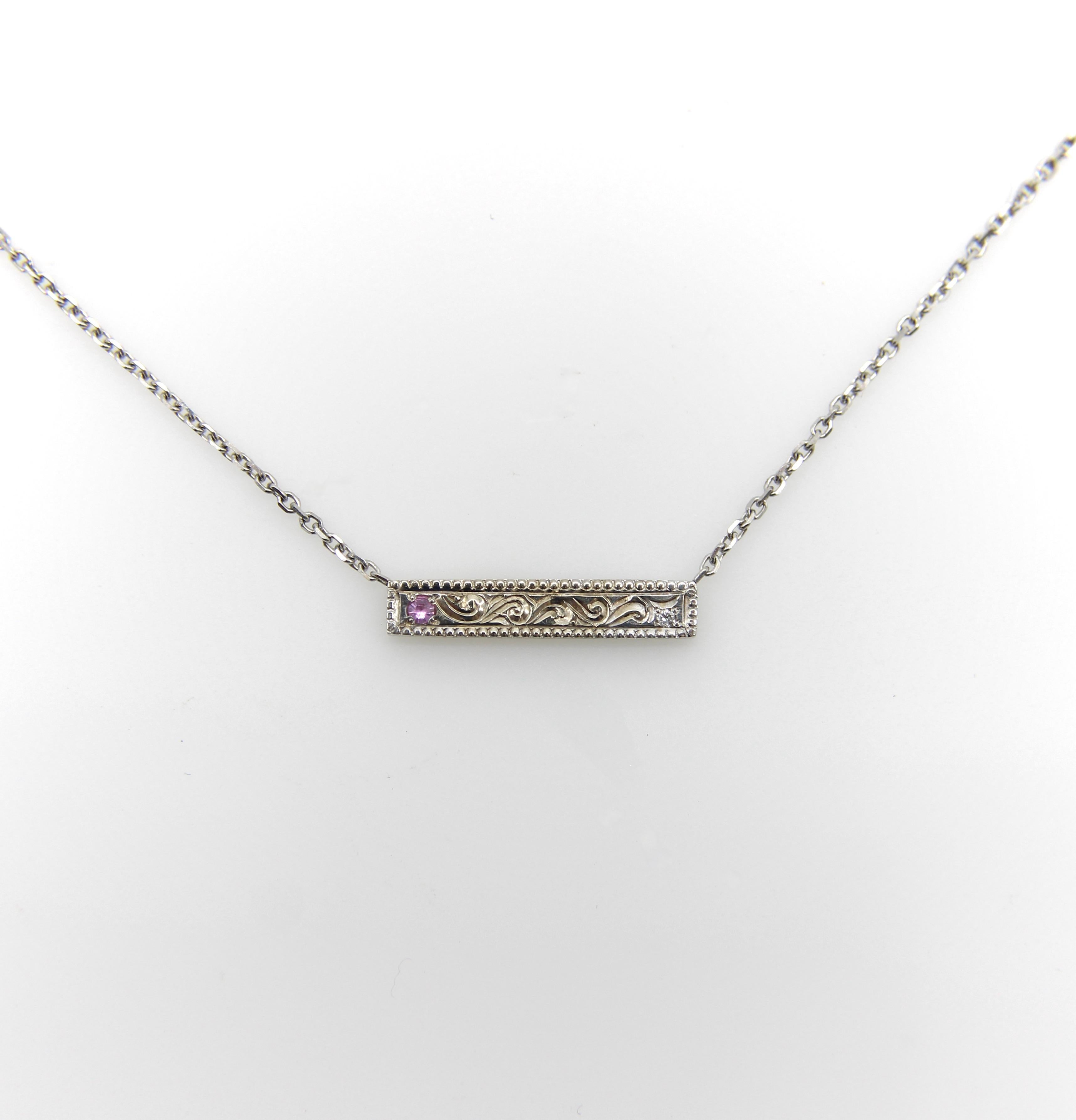 This one-of-a-kind 14k white gold necklace was handmade by Master Jeweler Michael von Krenner. A simple bar of white gold was used as a palate to hand-engrave with traditional scrolling foliate and a beautiful milgrain border. One end of the bar