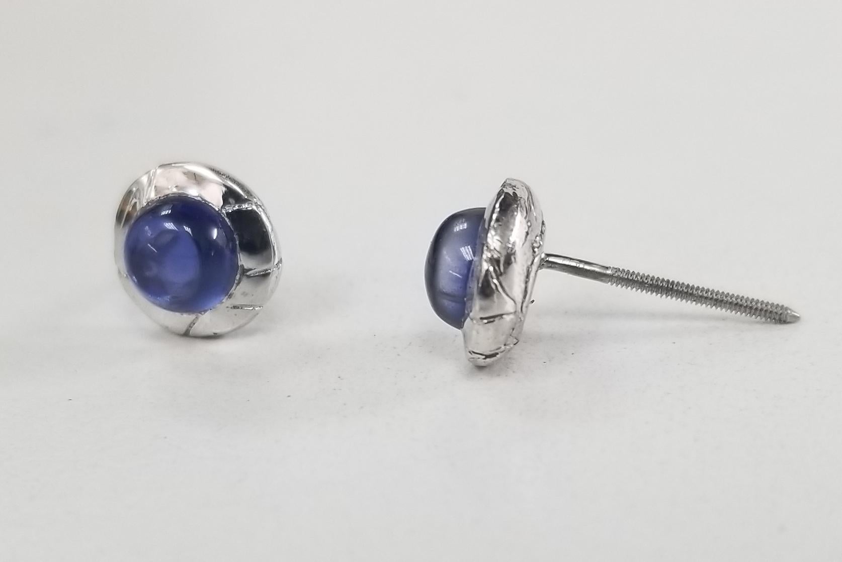 14k white gold bezel set sapphire cabochon cut earrings weighing .30pts.