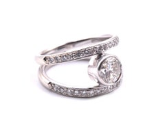 14 Karat White Gold Bezel Set Split Shank Diamond Engagement Ring