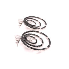 14 Karat White Gold Black and White Diamond Circular Earrings