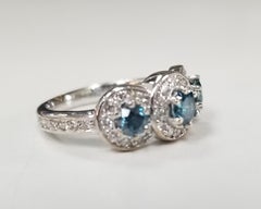 14k White Gold Blue Diamonds Set with White Diamonds Around the Center Diamonds