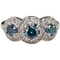 14k White Gold Blue Diamonds Set with White Diamonds Around the Center Diamonds