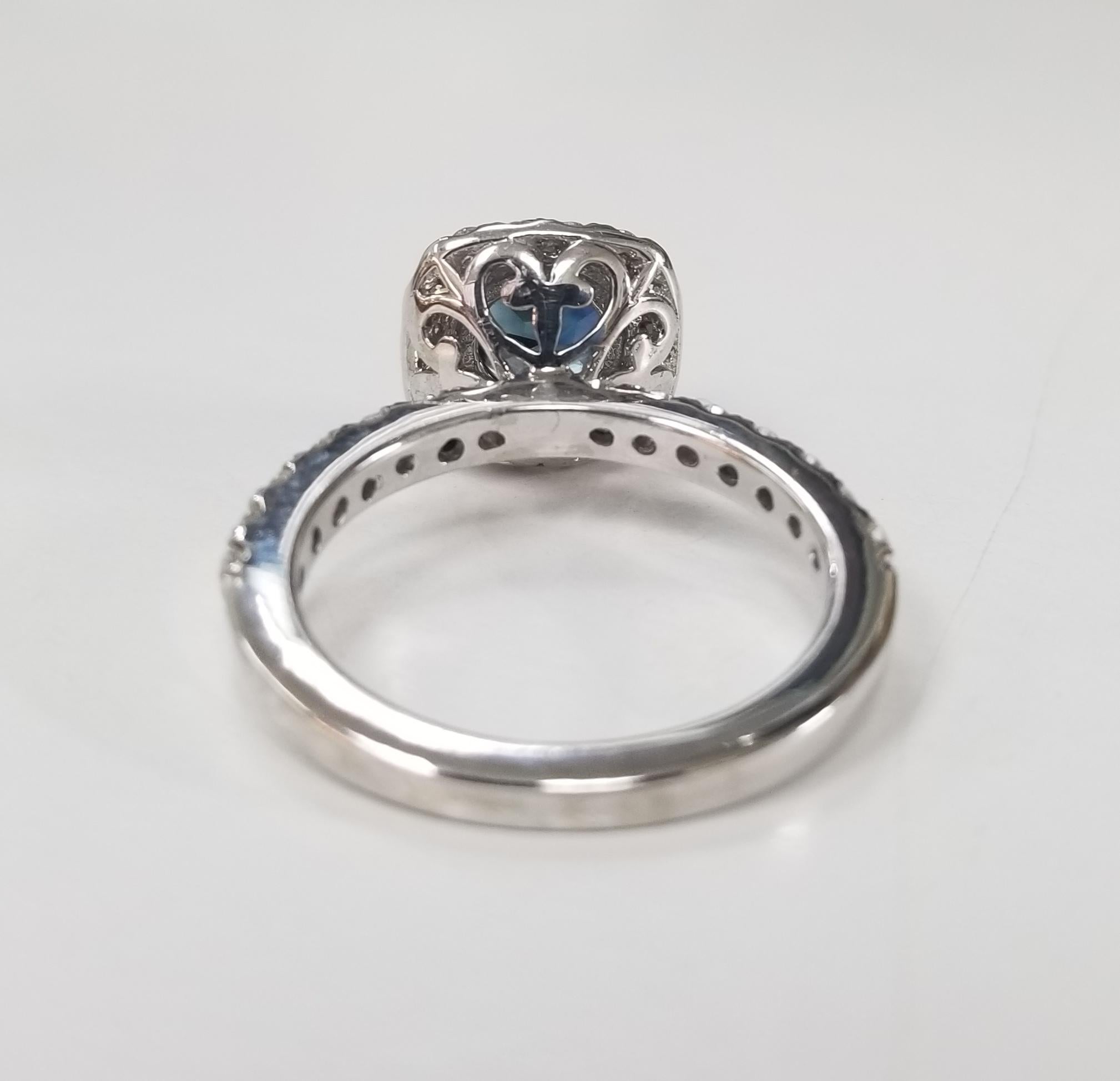 Round Cut 14 Karat White Gold Blue Sapphire and Diamond Halo Ring