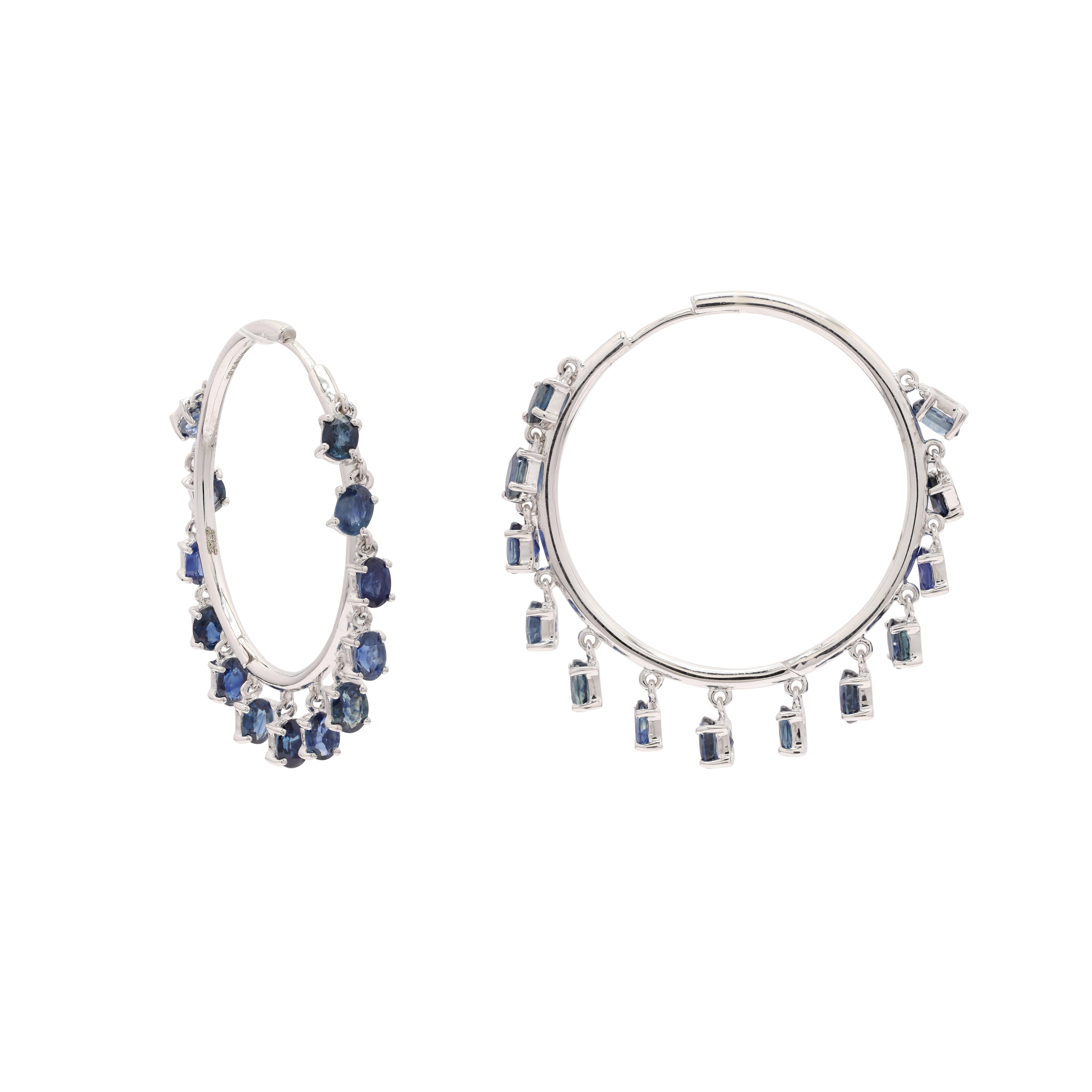 You shall need blue sapphire hoop earrings in 14K Gold to make a statement with your look. These earrings create a sparkling, luxurious look featuring oval cut gemstone.
If you love to gravitate towards unique styles, this piece of jewelry is