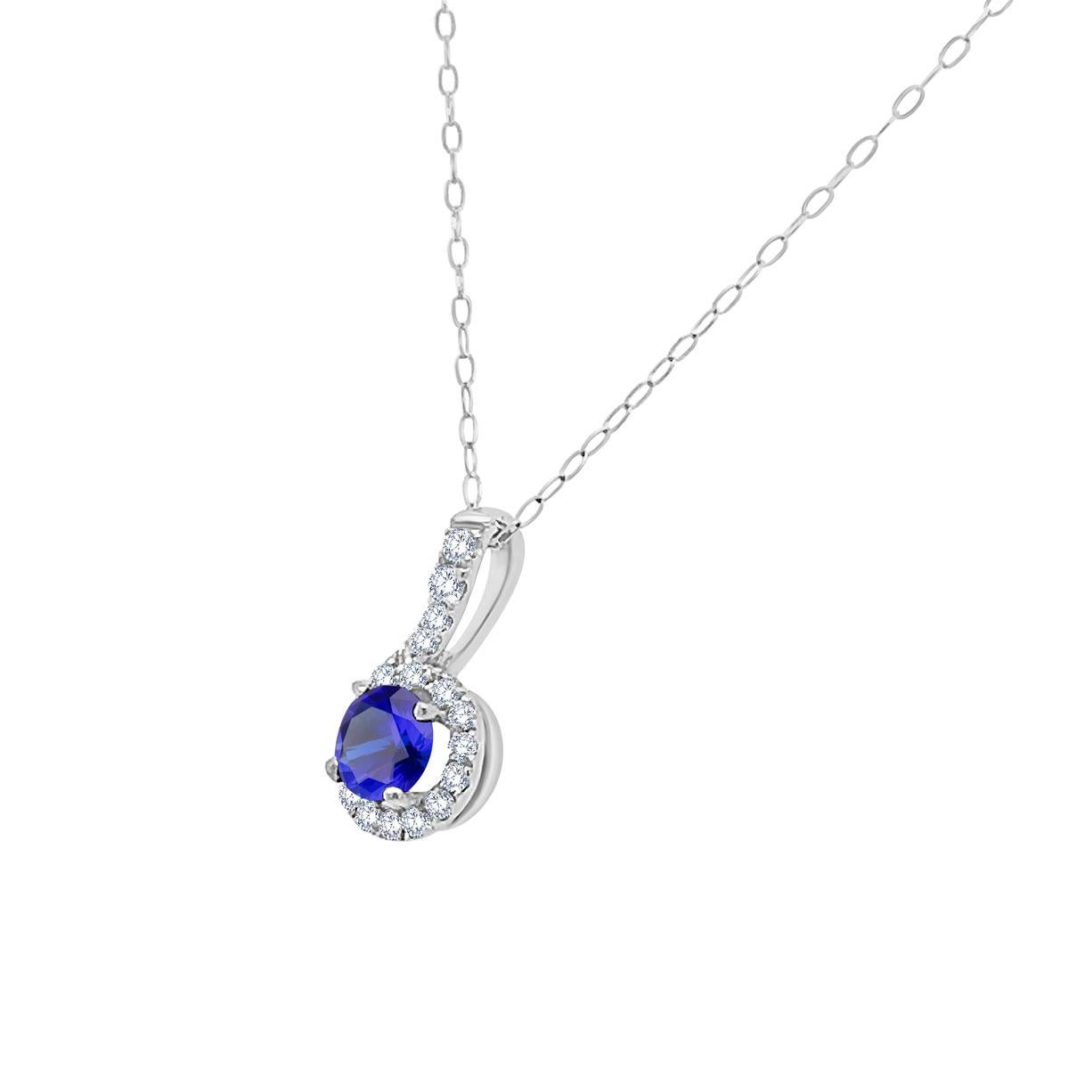 This 18k White gold pendant features a preminum quality 0.54 carat Round Shape Blue Sapphire, framed in a halo of 0.25 total carat weight of brilliant diamonds. This pendant is ideal for any occasions. Experience the Difference!

Product details: