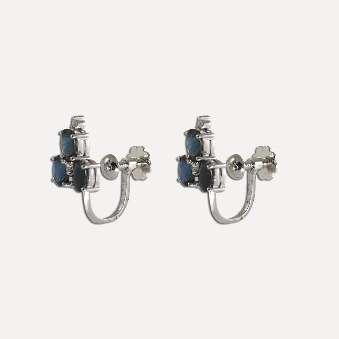 Sapphire earrings with small diamonds in 14k white gold settings.
Stamped 585 and weighs 3.7 grams.
The natural blue sapphires are oval shaped,  approximately 3.00 total carats, nice deep blue color.
There are two small, round diamonds on each