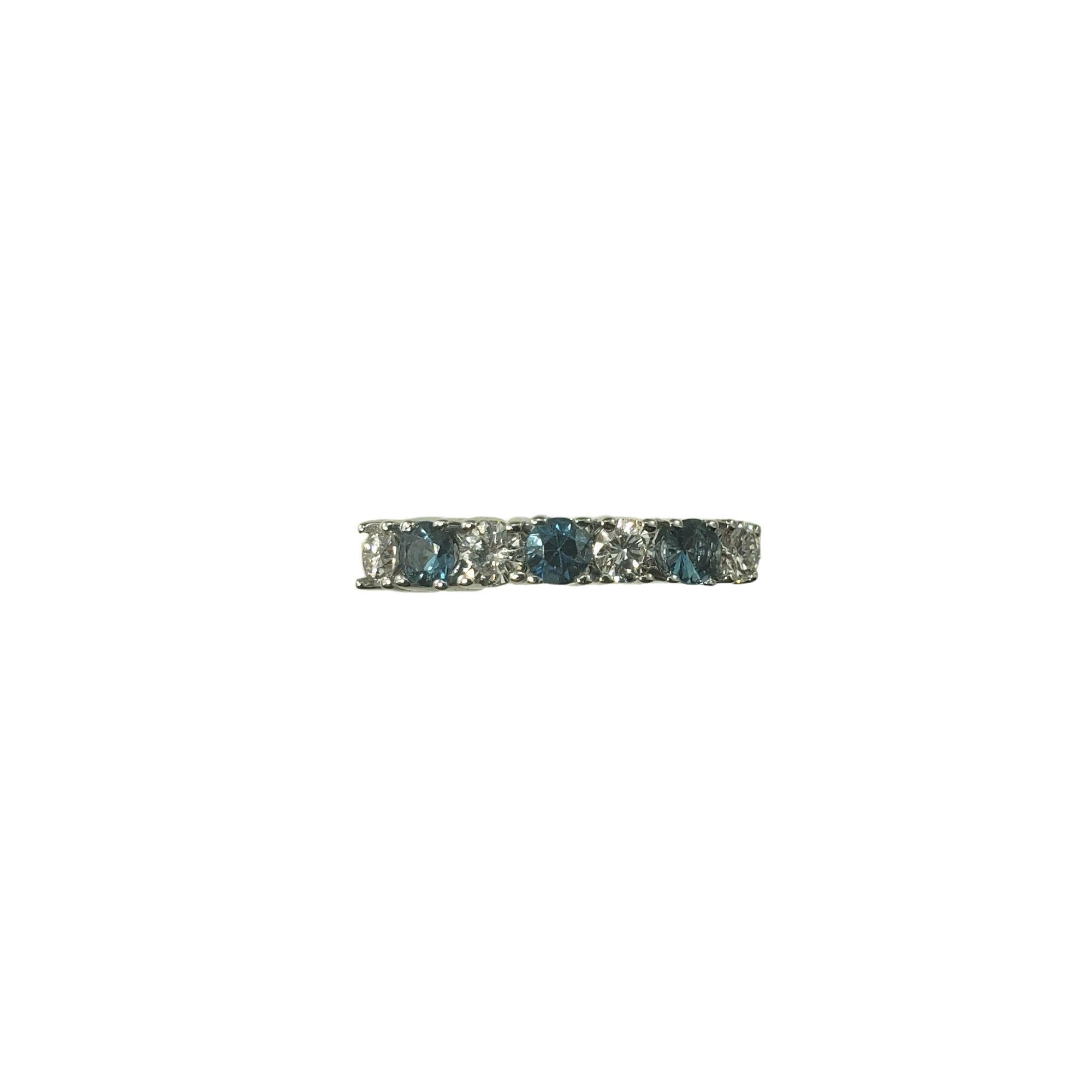 14 Karat White Gold Blue Topaz and Diamond Band Ring Size 7 JAGi Certified-

This stunning ring features four round brilliant cut diamonds and three round blue topaz set in classic 14K white gold. Width: 3 mm.
Shank: 2.5 mm.

Inner inscription reads