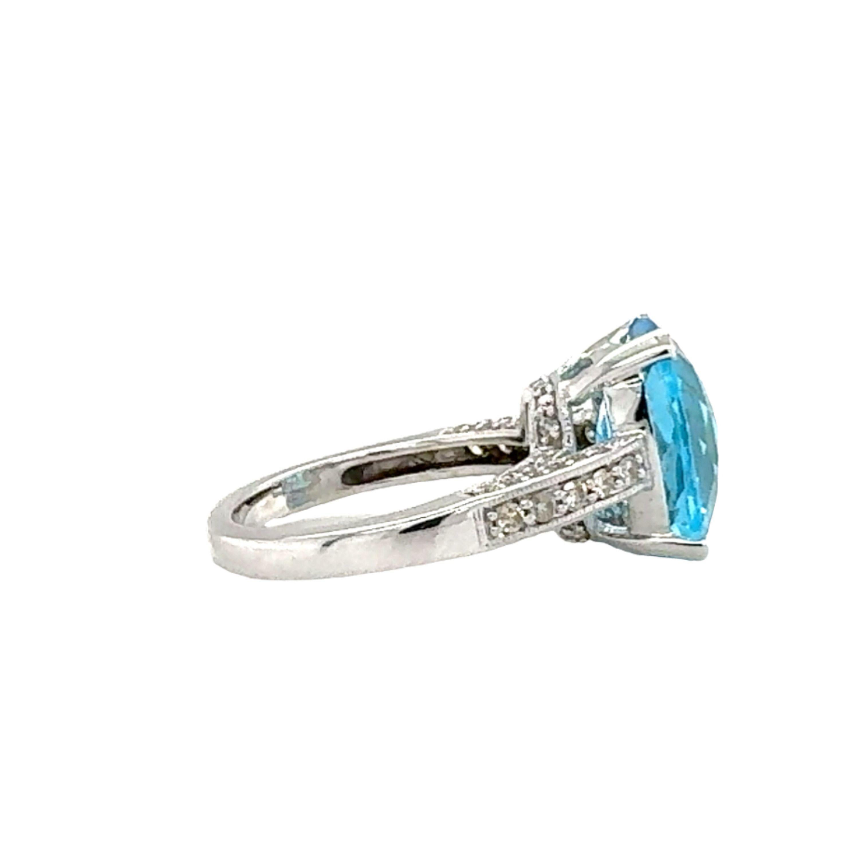 Cushion Cut 14K White Gold Blue Topaz and Diamond Ring For Sale