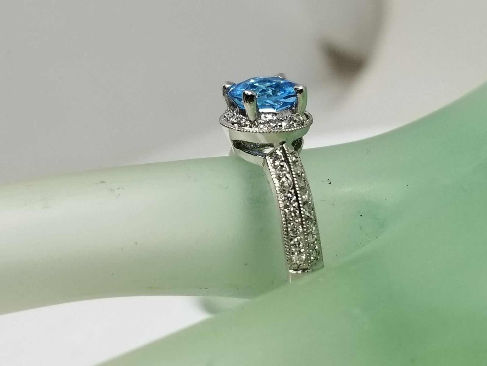 14 Karat White Gold Blue Topaz and Diamond Ring Paved on Knife Edge For Sale 1