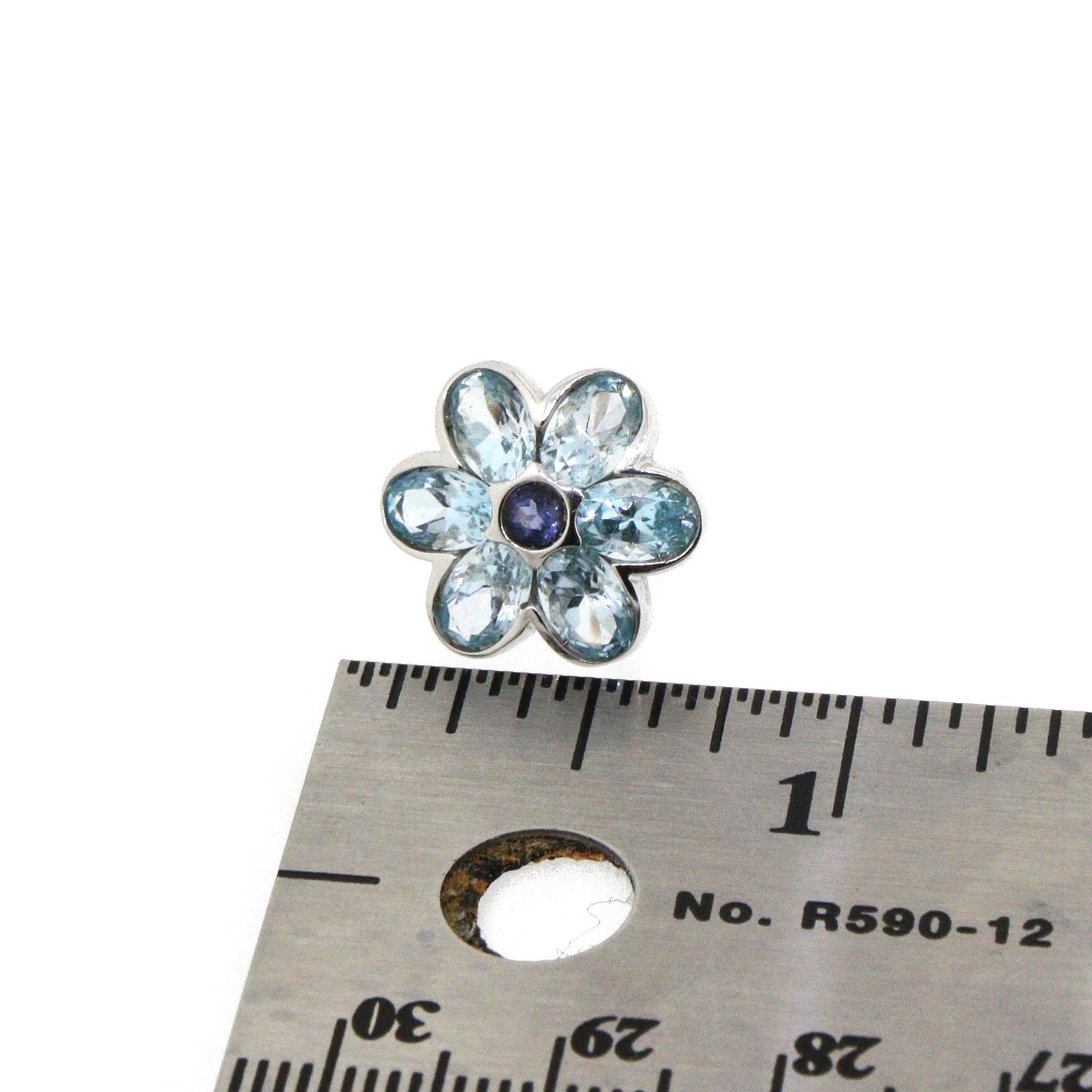 Oro bianco 14k
Pietre preziose: Zaffiro e Topazio blu
Peso totale: 7,28 grammi
Misura: 16 mm 