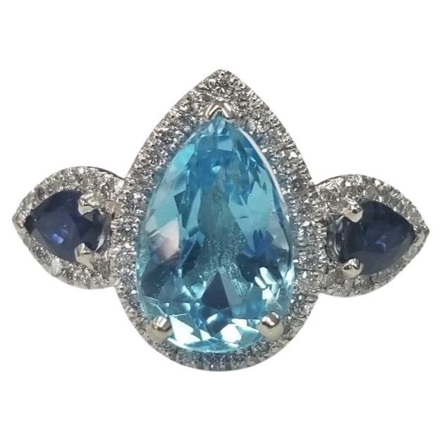  14k White Gold Blue Topaz, Blue Sapphire and diamond 3 stone halo ring