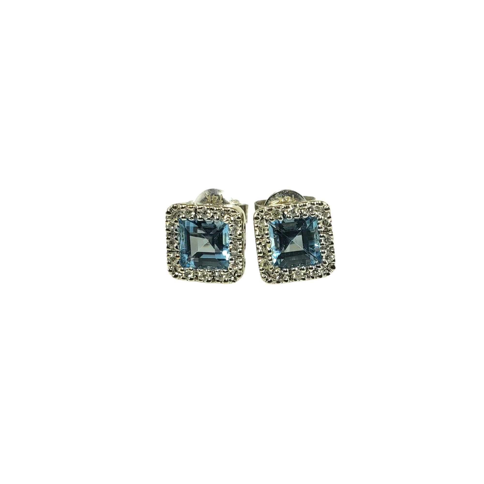 Vintage 14K White Gold Blue Topaz and Diamond Earrings Lab Certified-

These stunning earrings each feature one square cut blue topaz (5 mm x 5 mm) and 24 round brilliant cut diamonds set in classic 14K white gold.  Push back closures.

Total topaz