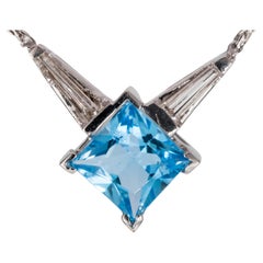 14k White Gold Blue Topaz Pendant with 0.25 Carat Diamond Accents & Gold Chain