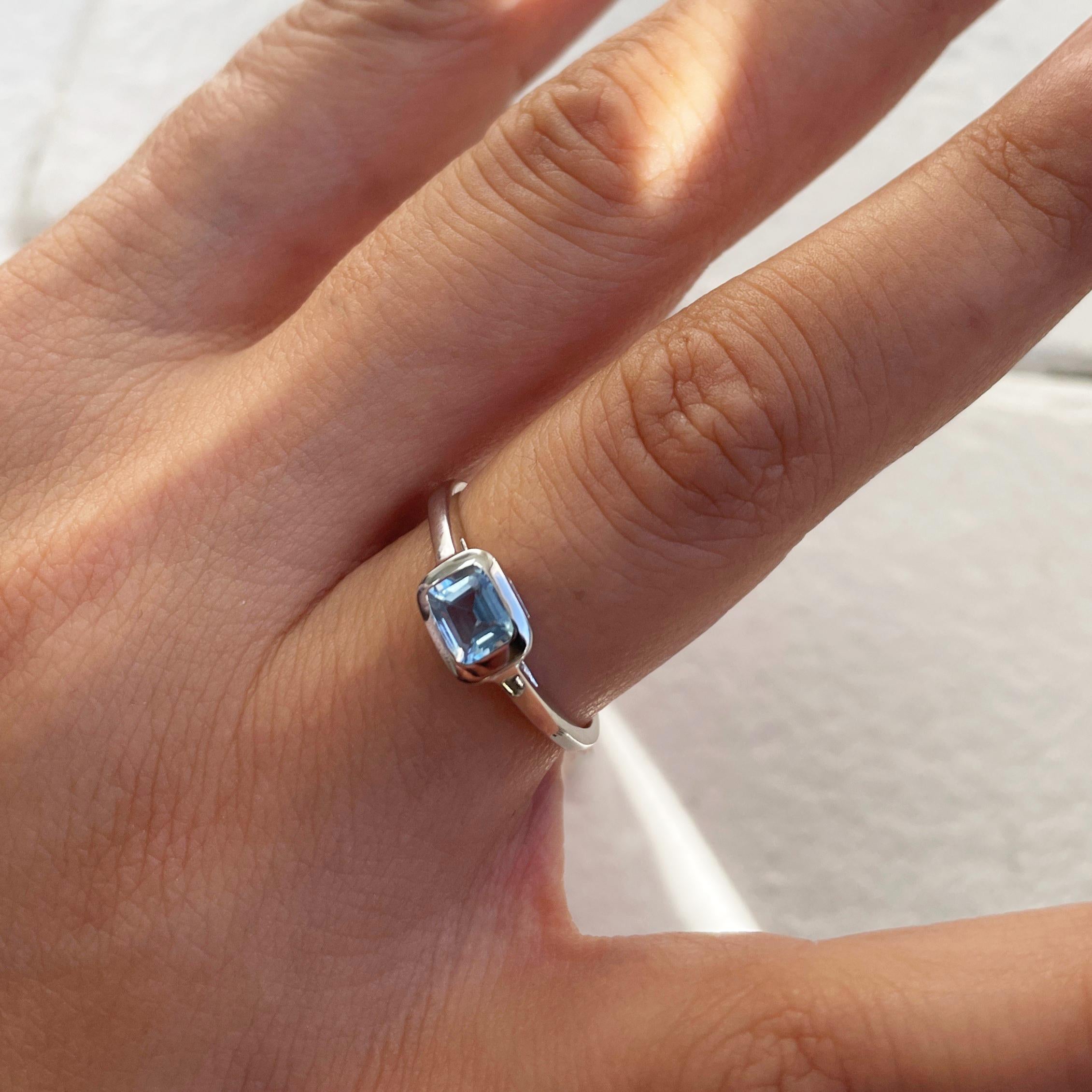 Charming Design - This stackable ring features a 14k gold band, and a emerald cut shaped gorgeous Blue Topaz approximately 0.50cts, available in  white, yellow and rose gold
 Measurements for ring size: The finger Size of this sapphire ring is 6.5