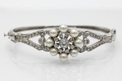 14k White Gold Bracelet with Diamonds and Pearls, contemporary piece.