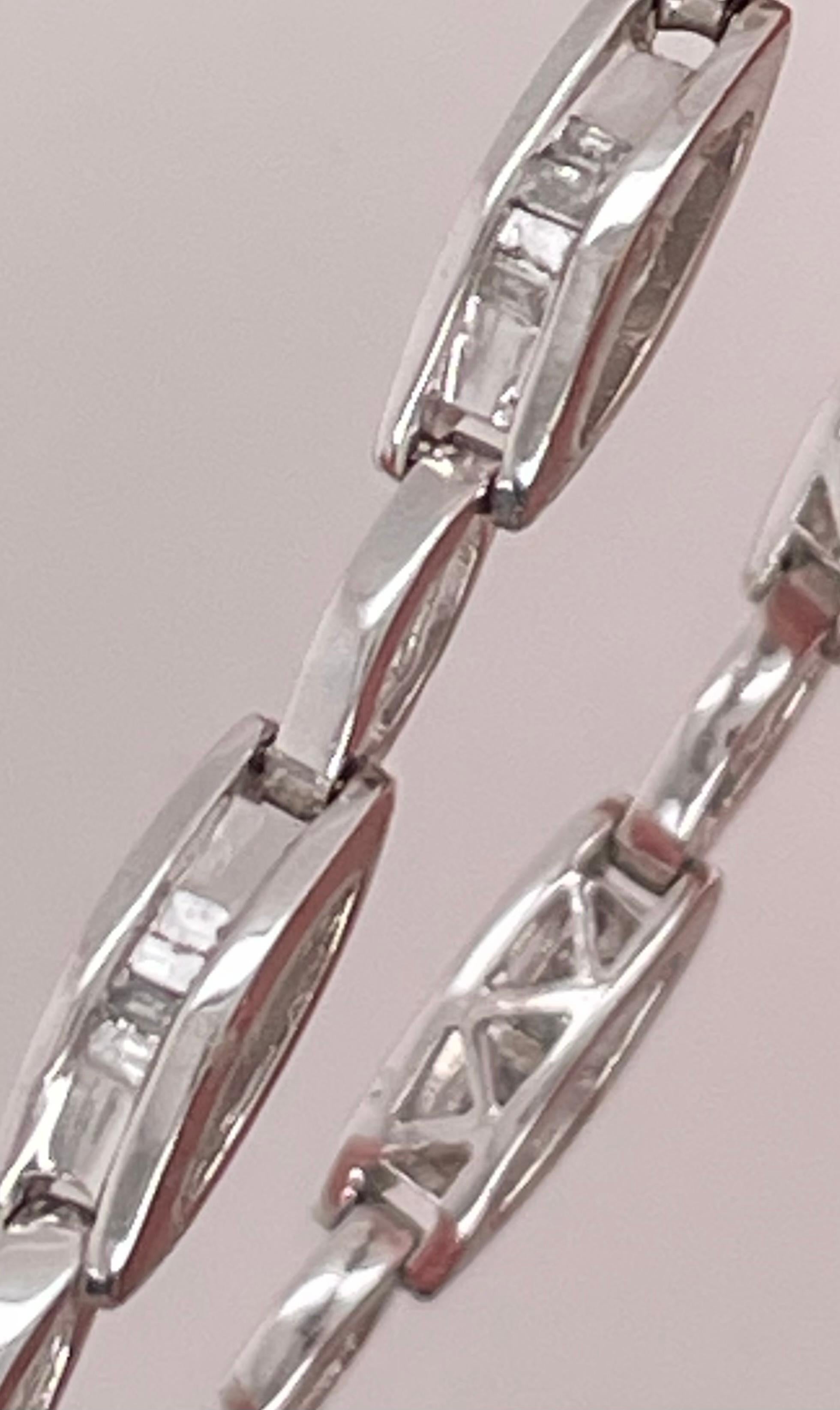 14K White Gold Bracelet with Diamonds

Length: 7.5 inches
Weight: 10.6 grams
