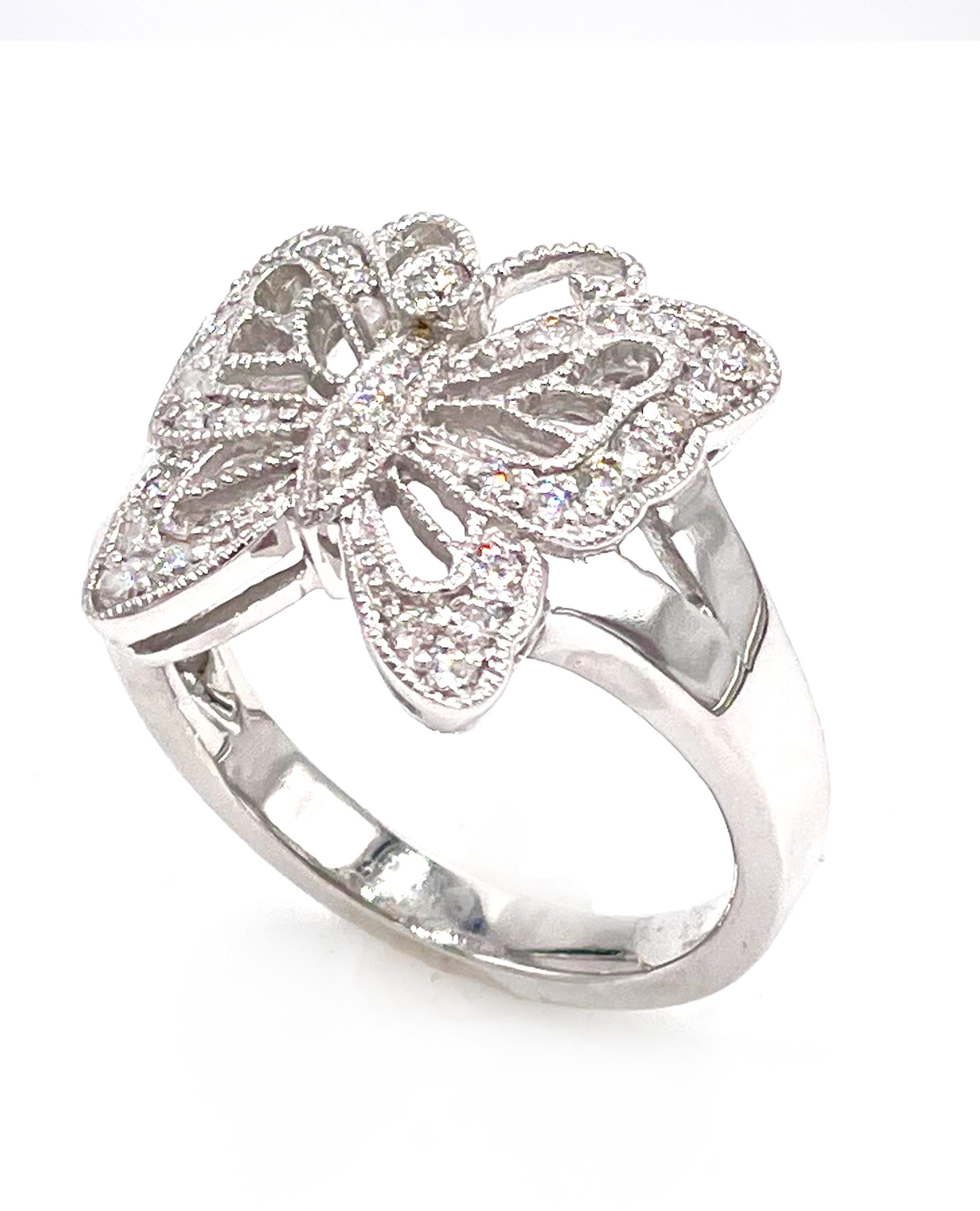 14K white gold butterfly ring furnished with 42 round brilliant-cut diamonds 0.34 carats total weight.

* Finger size 6.5
* Diamonds are H color, SI clarity