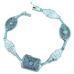 Bracciale con diamanti in vetro canforato in oro bianco 14K lungo 7", anni '30, antico