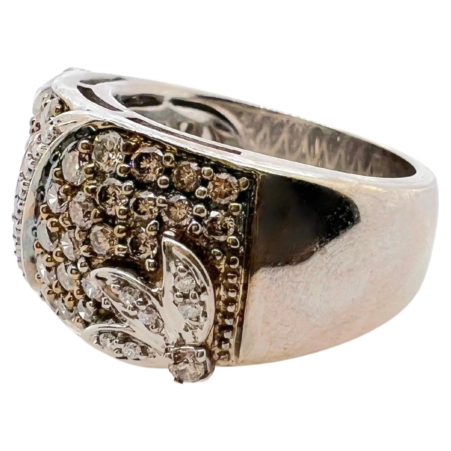 This beautiful champagne-colored diamond band is set in a 14k white gold mounting!  This ring is an eye-catcher with a small number of white diamonds to contrast the colored diamonds.  This can be worn smart casual or dressed up!


Size: 6.75 / can