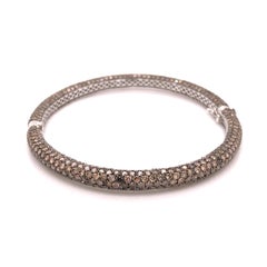 14 Karat White Gold Champagne Diamond Hinged Bangle