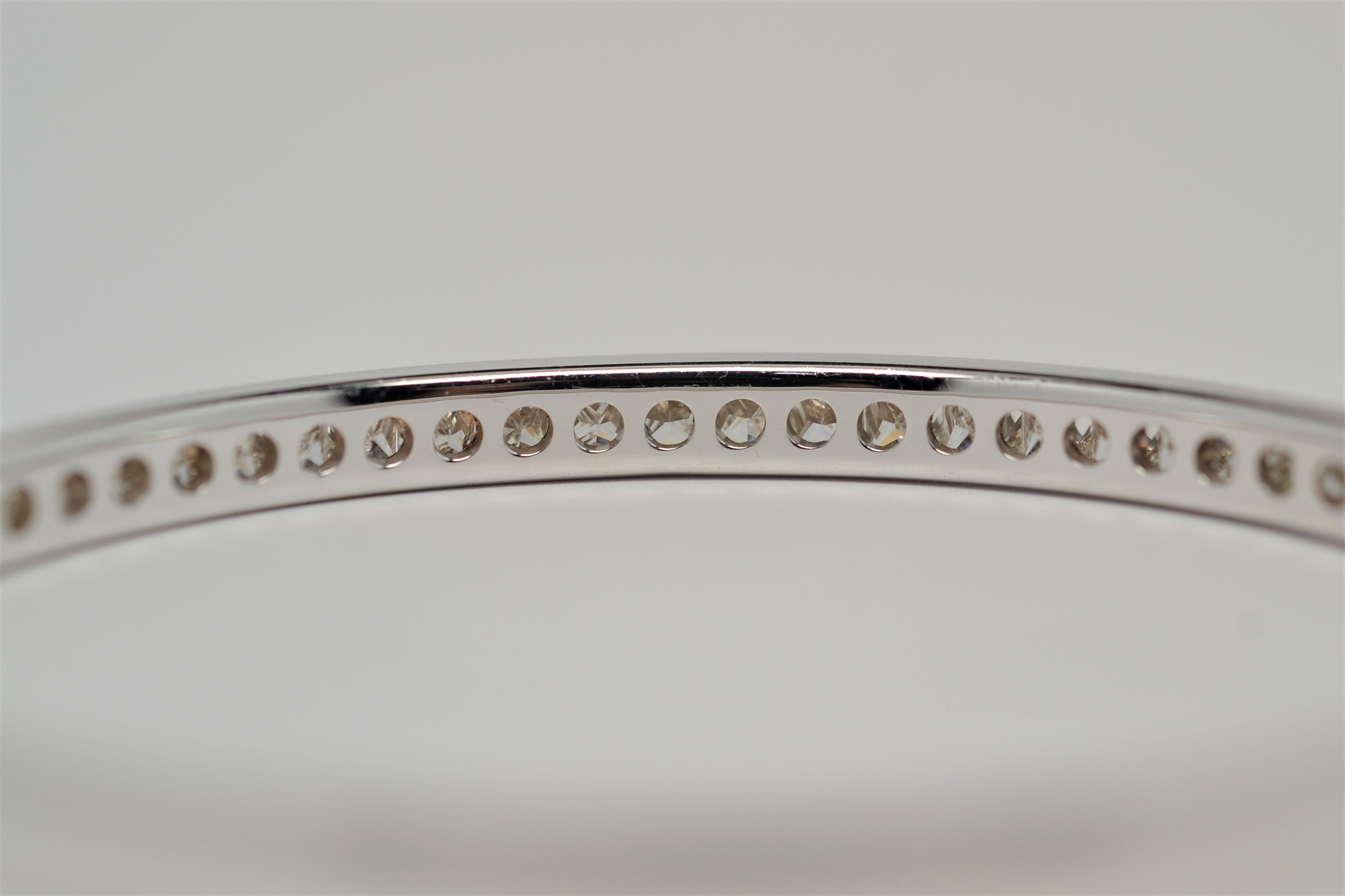 14k White Gold Channel Set Bangle with Princess Cut Diamonds, 6.25 Carats In New Condition For Sale In New York, NY