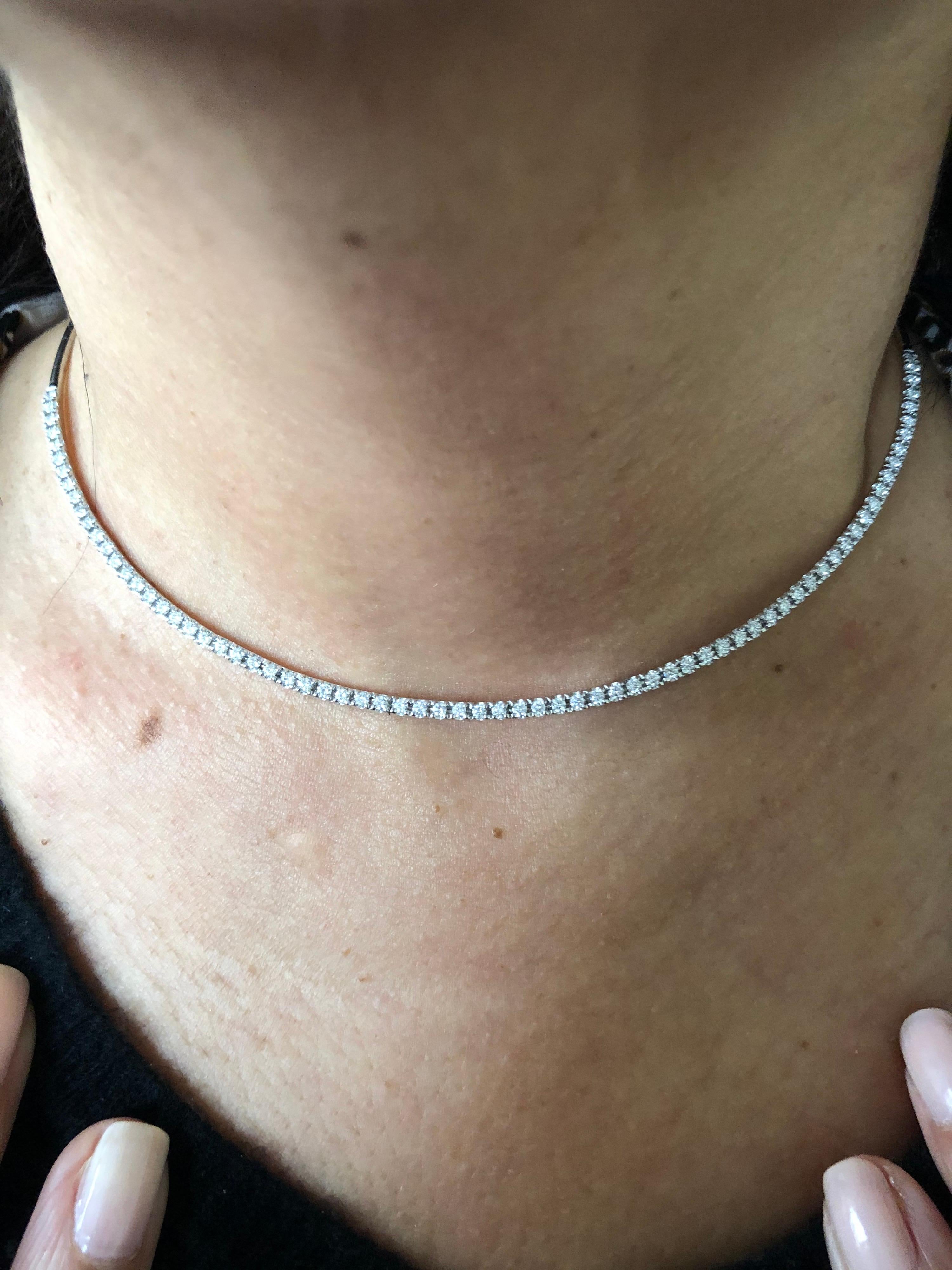 Choker necklace set in 14K white gold. The choker necklace is a rigid style and the diamonds are set half-way. The total carat weight of the necklace is 2.16 carats. The stones are G, the clarity is SI1-SI2. The necklace is available in yellow gold.