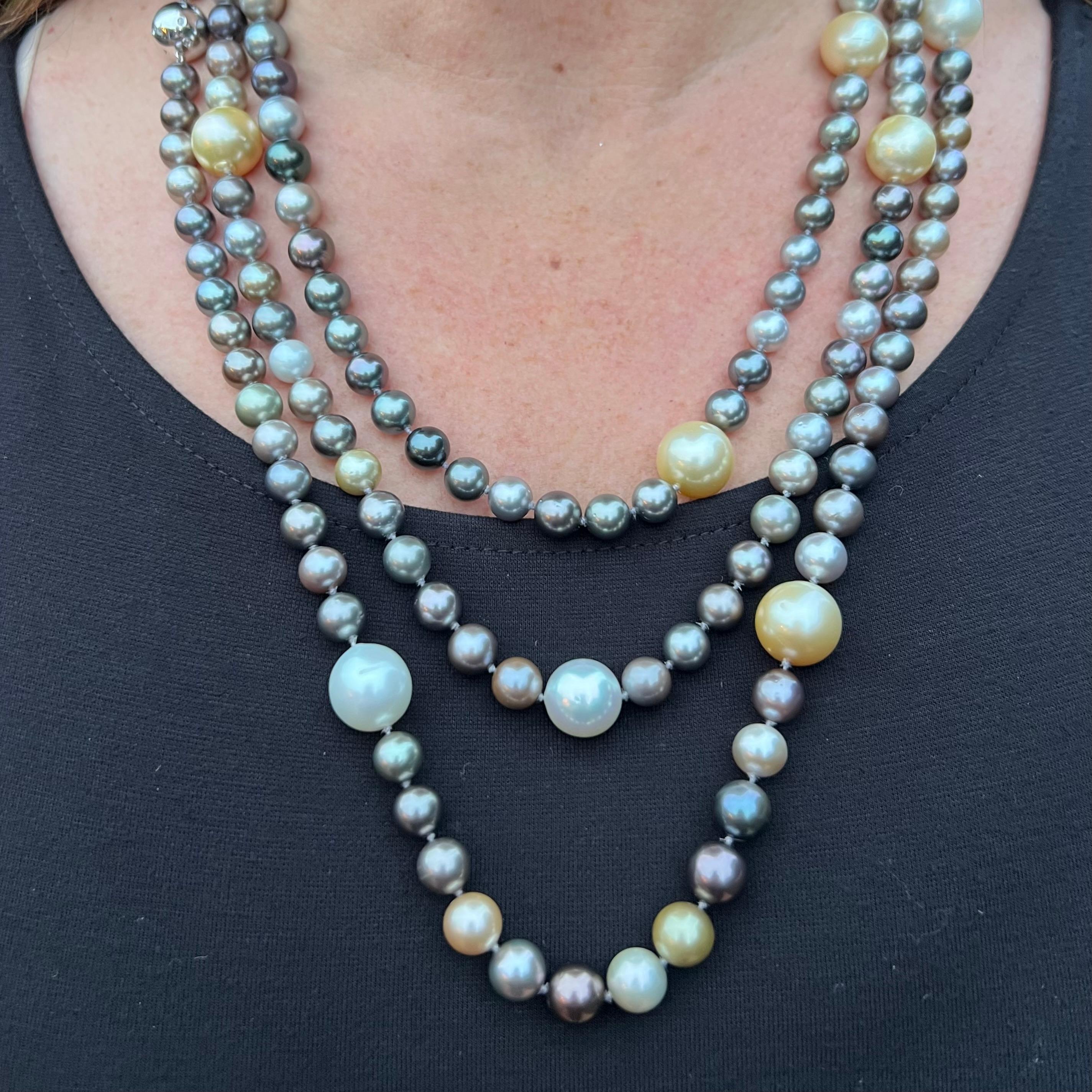 Have fun with pearls! This versatile necklace is designed with 11 white and golden off round and semi-baroque South Sea cultured pearls, measuring approximately 14.00 to 12.00 mm, stationed among 176 multi-color cultured pearls, measuring from