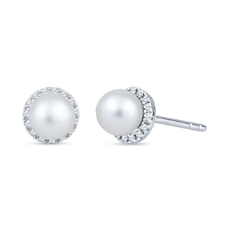 These earrings feature two freshwater pearls surrounded by .20ctw of round diamonds set in 14k white gold. These versatile earrings can be worn as a stud or the drop can be added for a different look. You will have two different looks to match your
