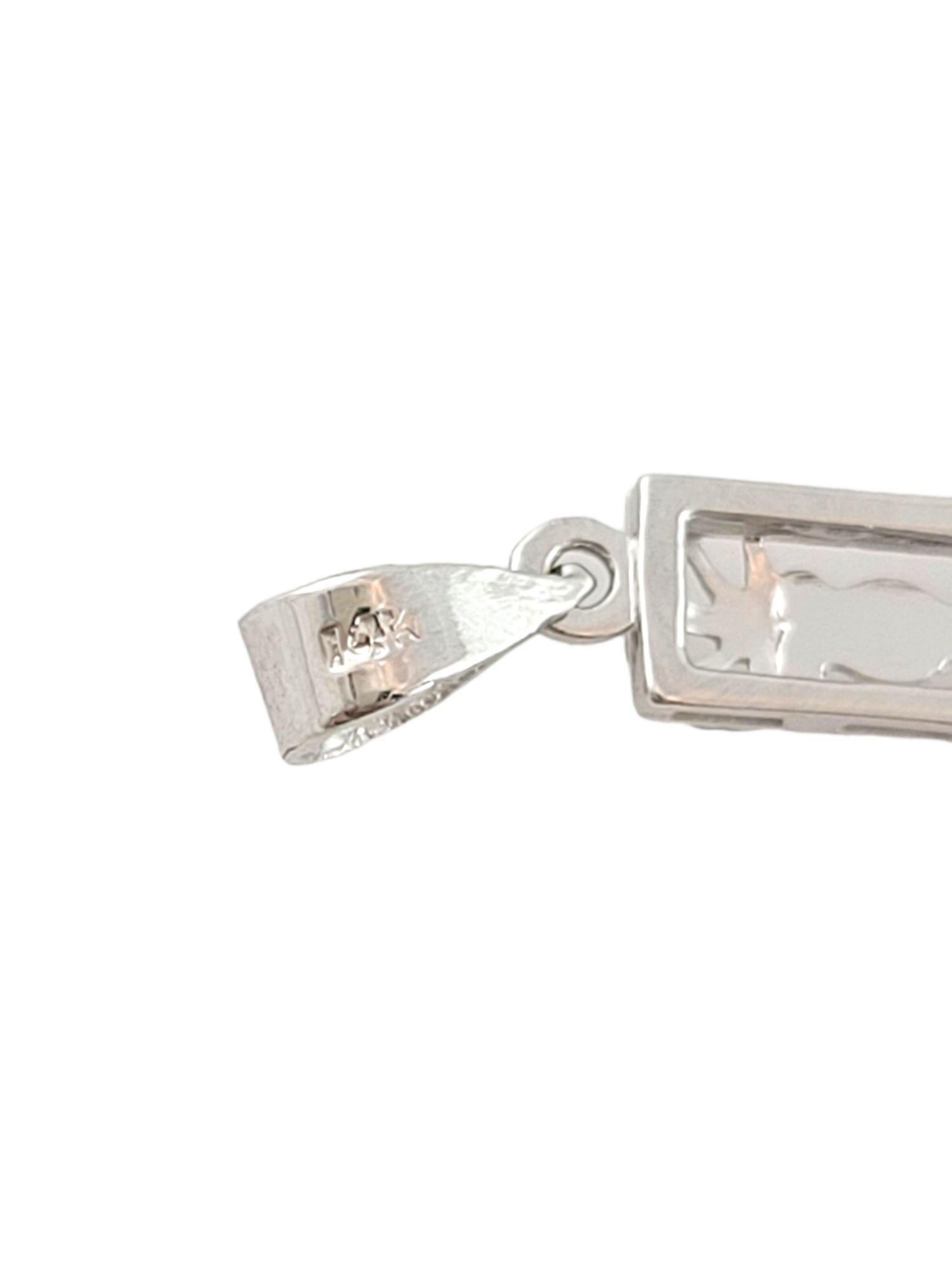 Colgante vintage de oro blanco de 14 quilates en forma de cruz con diamante

Este precioso colgante en forma de cruz de oro blanco de 14 quilates está decorado con un magnífico diamante de talla única en el centro.

Peso del diamante: 0,03