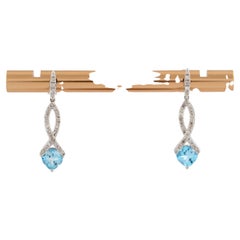 14K White Gold Cushion Cut Blue Topaz Infinity Drop Pendant