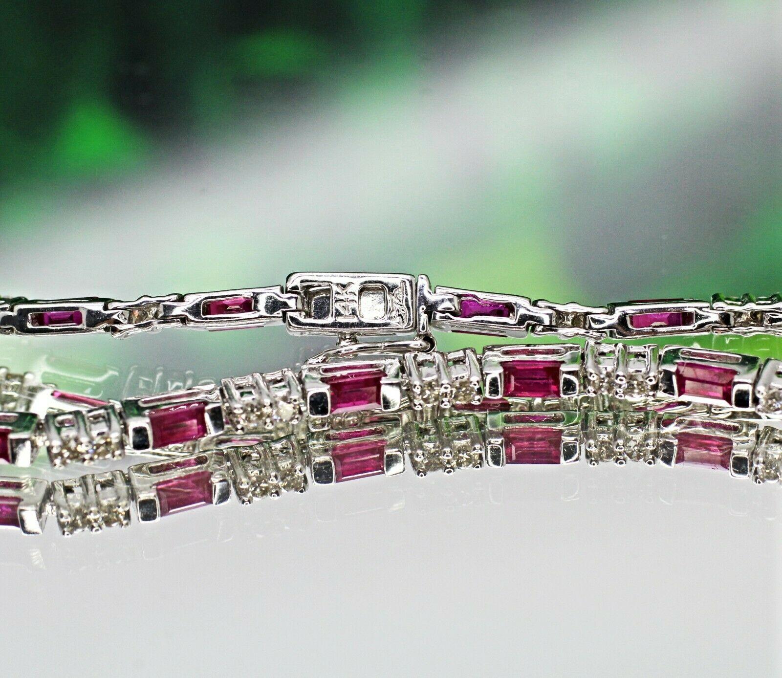  Beautiful 14K white gold custom made bracelet with 17 pieces emerald cut  ruby in 0.10 carat each stone and 35 pieces of round cut diamonds in approximately 0.50 carat total weight. 
Specifications:
    main stone: RUBY APPROX. 0.10 CT EACH 17PCS.

