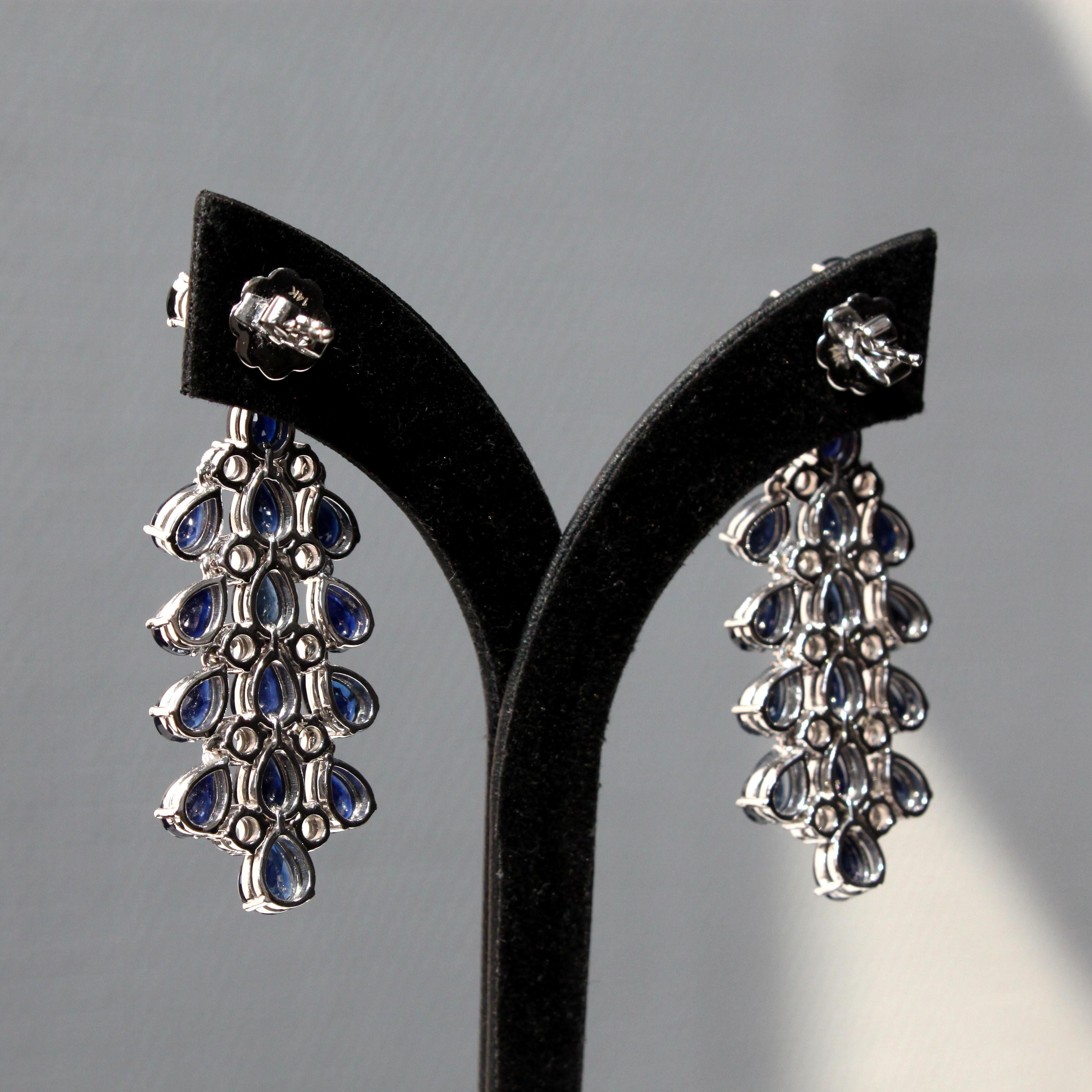 Pear Cut 14K White Gold Dangle Earrings with Cascading Blue Sapphires For Sale