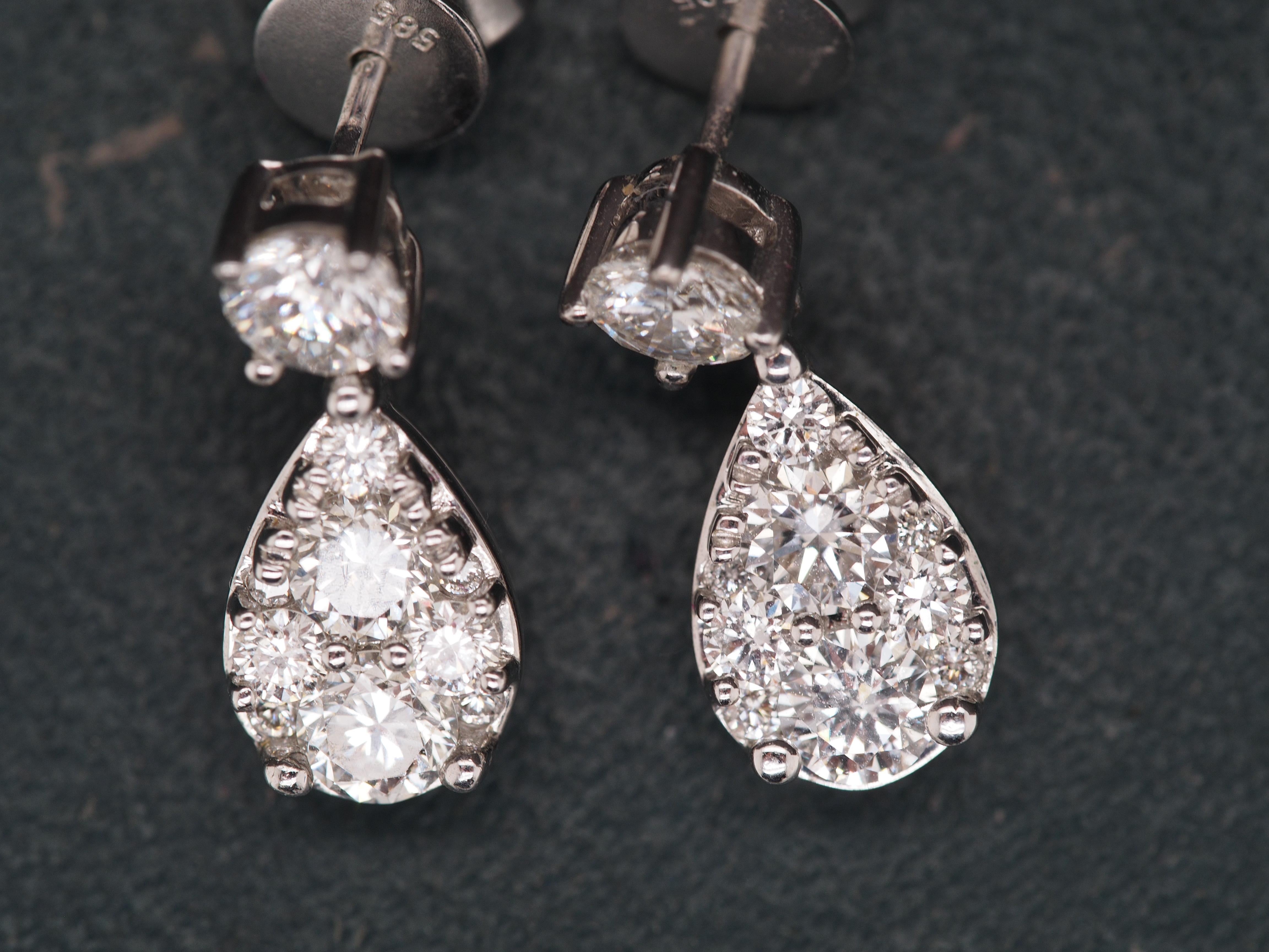 Contemporary 14K White Gold Dangling Drop Diamond Cluster Earrings For Sale