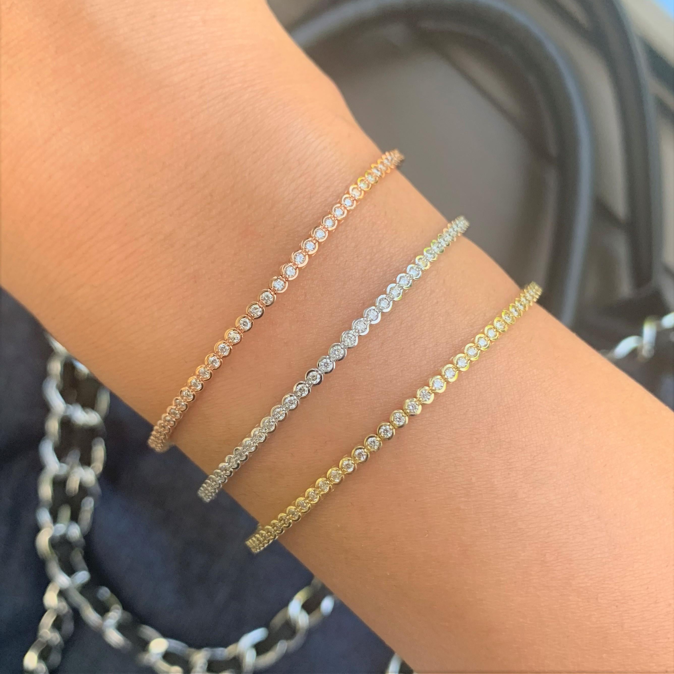 Quality Stackable Bangle: Made from real 14k gold and 80 glittering white approximately 0.96 ct. Certified diamonds, featuring a single row of white diamonds flexible diameter for comfort with a color and clarity of GH-SI
 Surprise Your Loved One