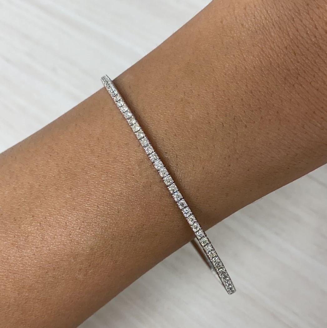 Quality Stackable Bangle: Made from real 14k gold and 39 glittering white approximately 0.99 ct. Certified diamonds, featuring a single row of white diamonds flexible diameter for comfort with a color and clarity of GH-SI
 Surprise Your Loved One