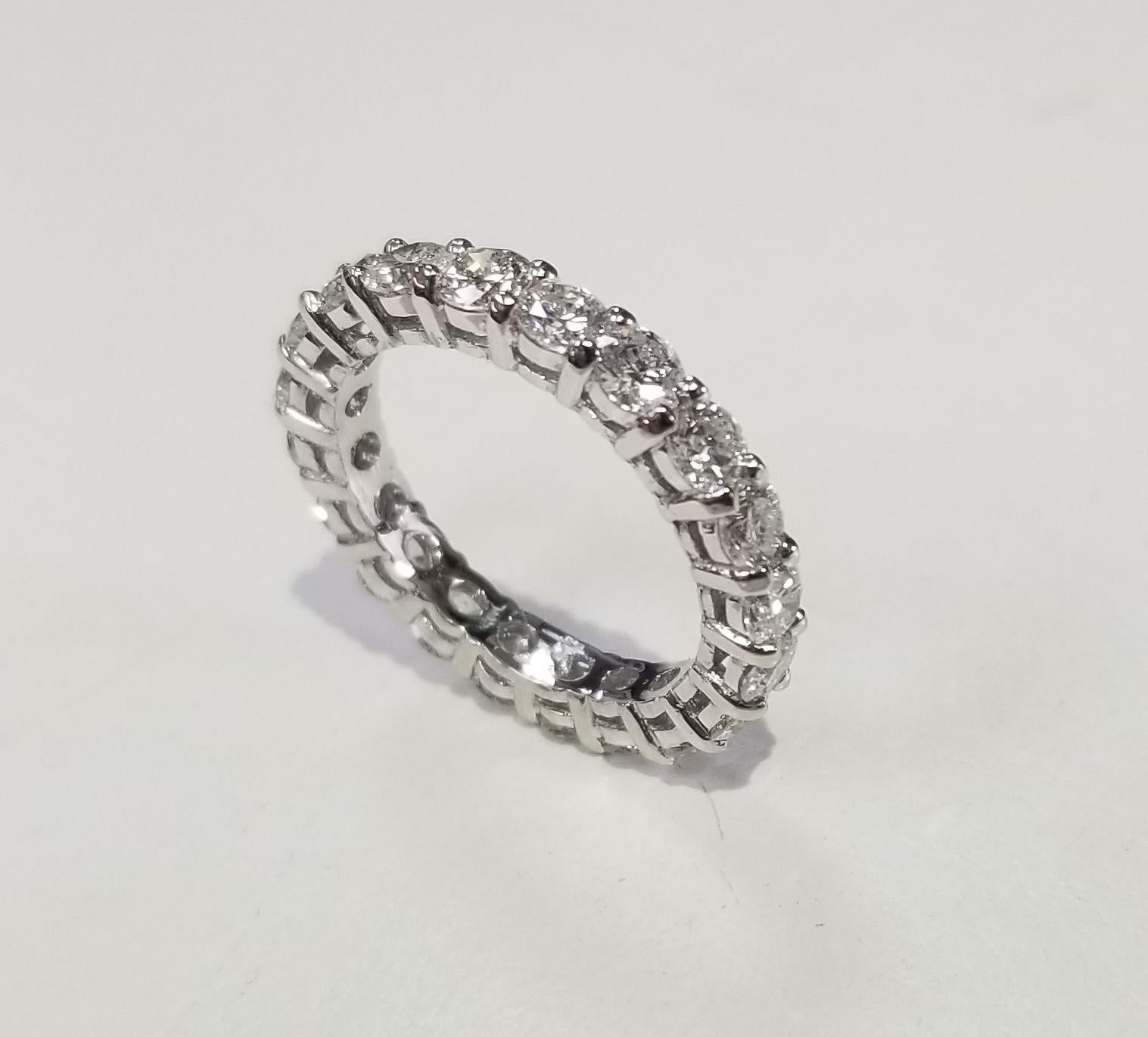 14k white gold diamond eternity ring with shared prongs
Specifications:
    diamonds: 20 PCS ROUND CUT DIAMONDS
    carat total weight: APPROX 2.50 CT.
    color: G
    clarity: VS2
    metal: GOLD
    type: WEDDING BAND ring
    weight:  2.8 Grams
