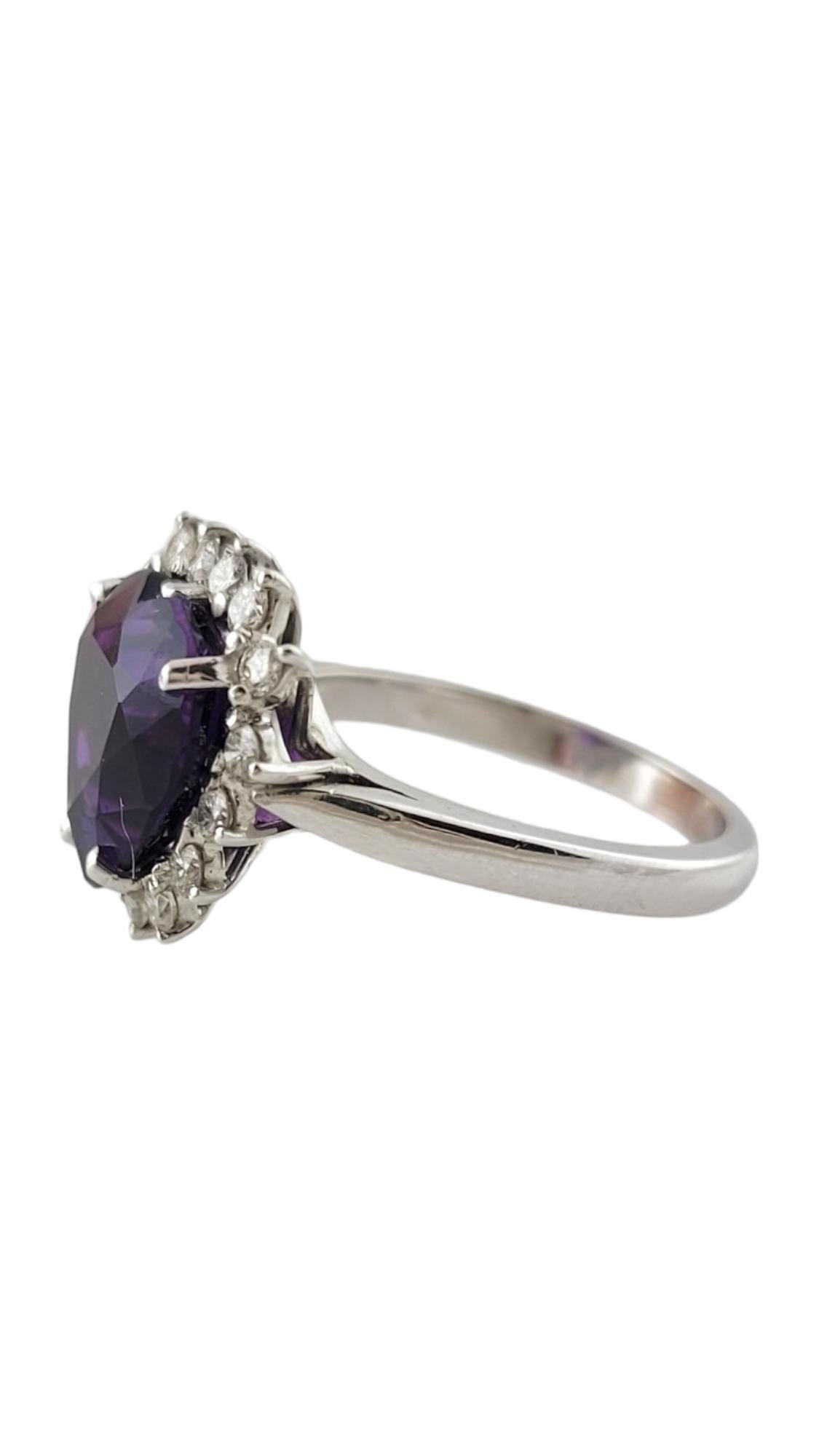 14K White Gold Diamond & Amethyst Halo Style Ring Size 6.25

This beautiful 14K white gold ring features a heart shaped cut amethyst stone with a halo of 15 sparkling, round brilliant cut diamonds!

Heart shaped amethyst is approx. 4.07 cts, eye