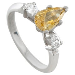 Bague en or blanc 14 carats sertie d'un diamant et d'un diamant orange naturel de 0,74 ct