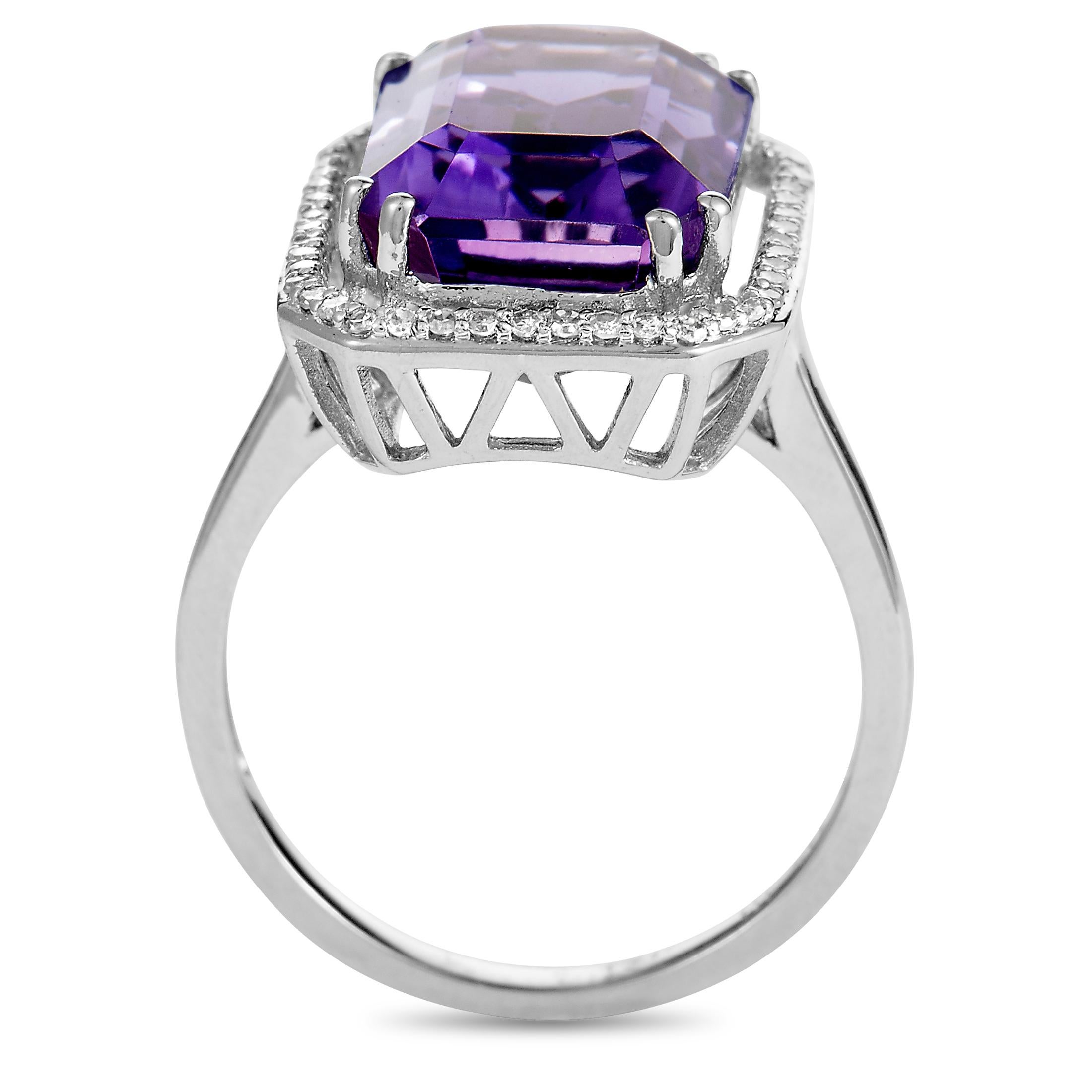 This ring is made of 14K white gold and weighs 5.4 grams, boasting band thickness of 2 mm and top height of 10 mm, while top dimensions measure 14 by 18 mm. The ring is set with an amethyst and a total of 0.20 carats of diamonds.
 
Offered in brand